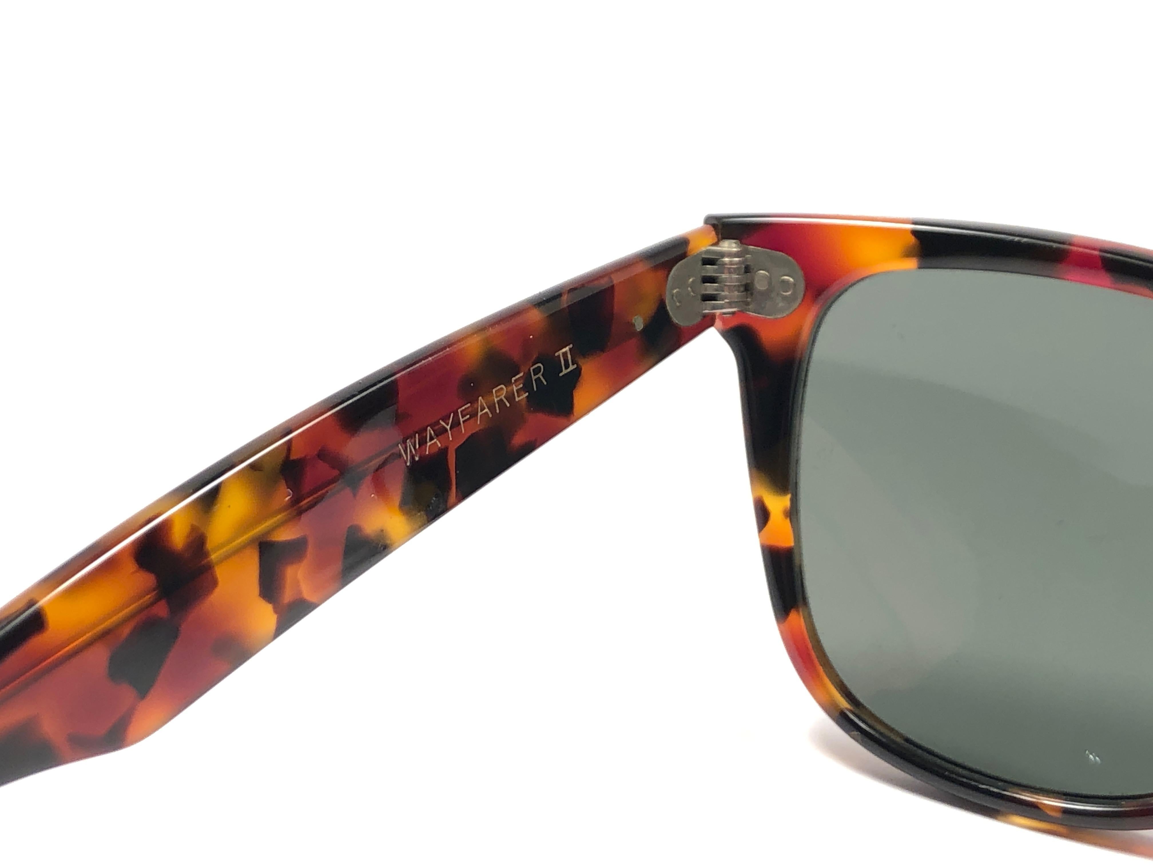 New classic Wayfarer II in tortoise.  B&L etched in both G15 grey lenses. Please notice that this item is nearly 40 years old and could show some storage wear.  New, ever worn or displayed. Made in USA.
