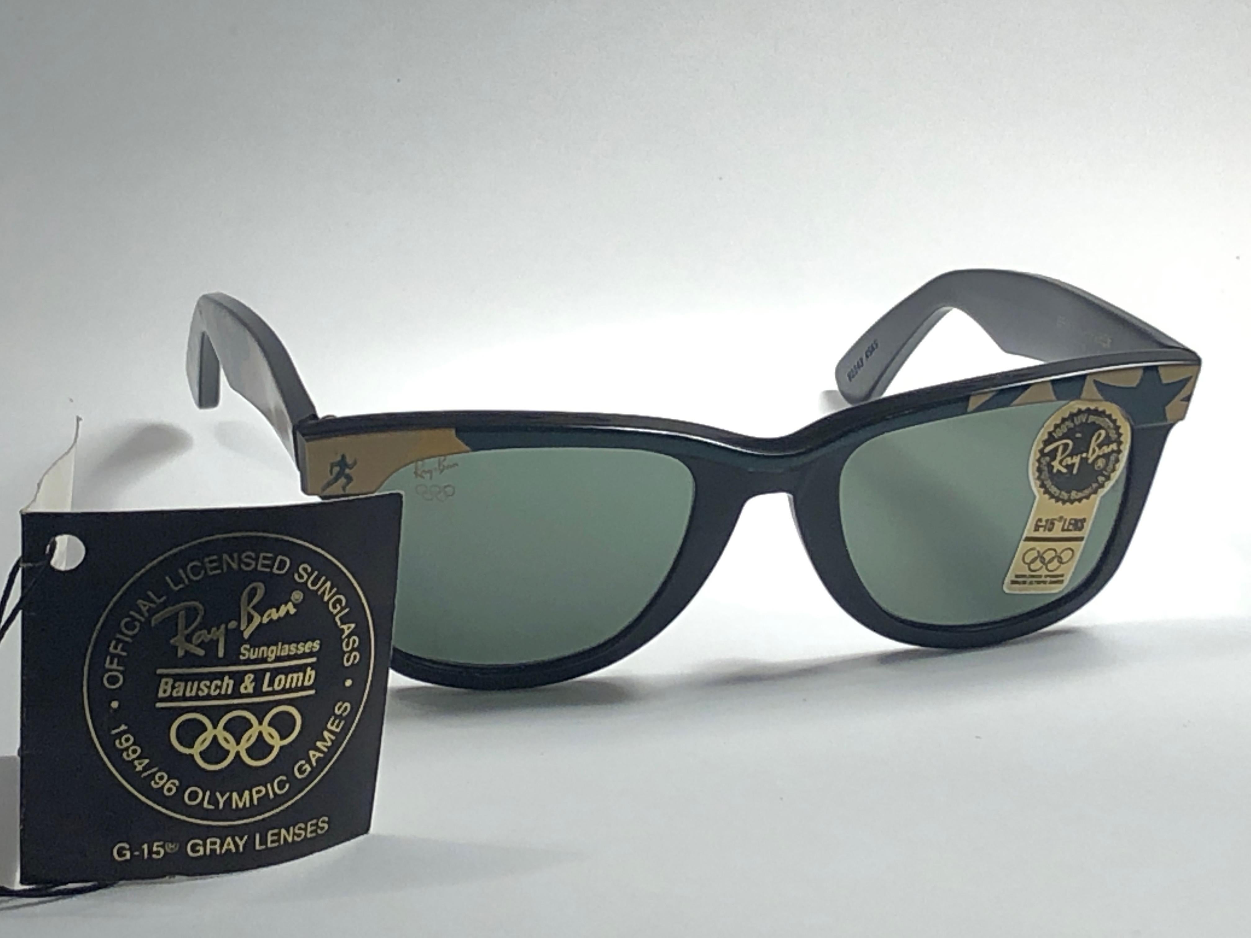 New classic Wayfarer Atlanta 1996 Olympic Games. B&L etched in both G15 grey lenses. 
Please notice that this item is nearly 40 years old and could show some storage wear.  
New, ever worn or displayed.

Made in USA.