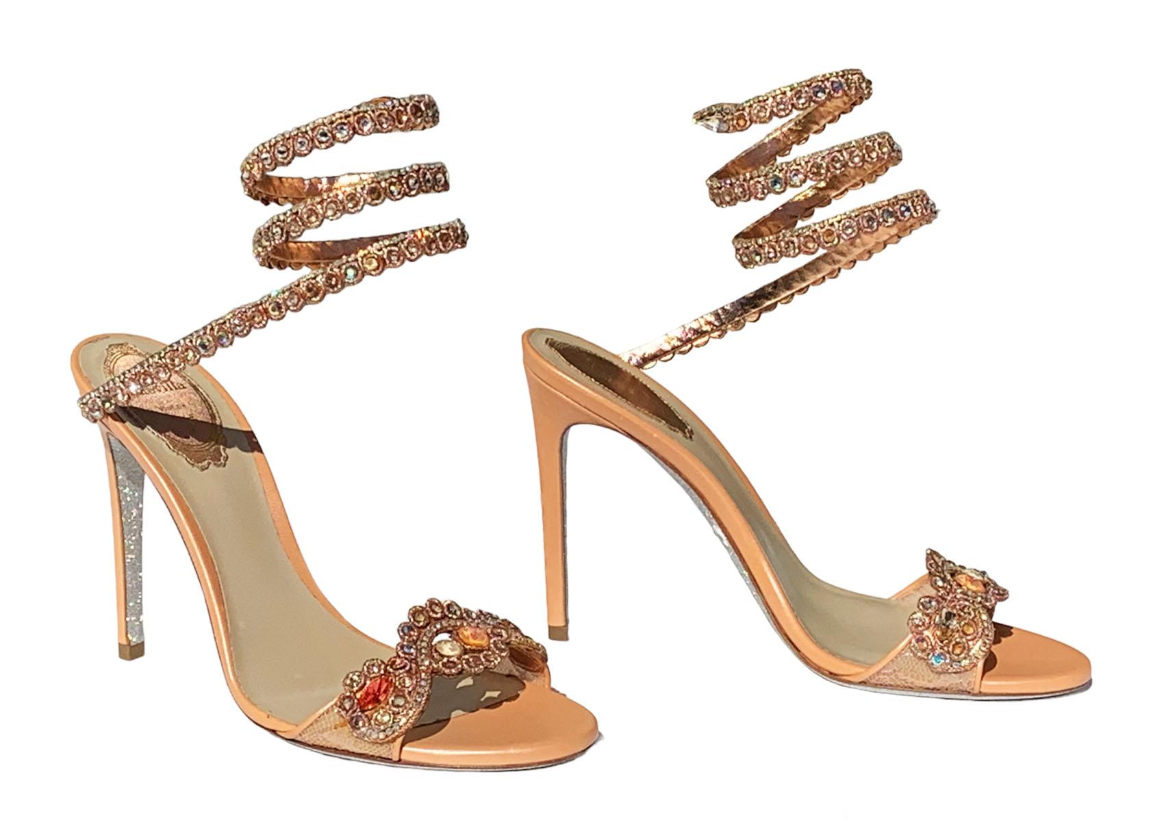 New Rene Caovilla Crystal Embellished Leather Shoes Sandals
Italian size - 38
Signature snake coil corkscrew wraparound ankle strap. Peach color. Colorful crystal embellishment. 
4.3