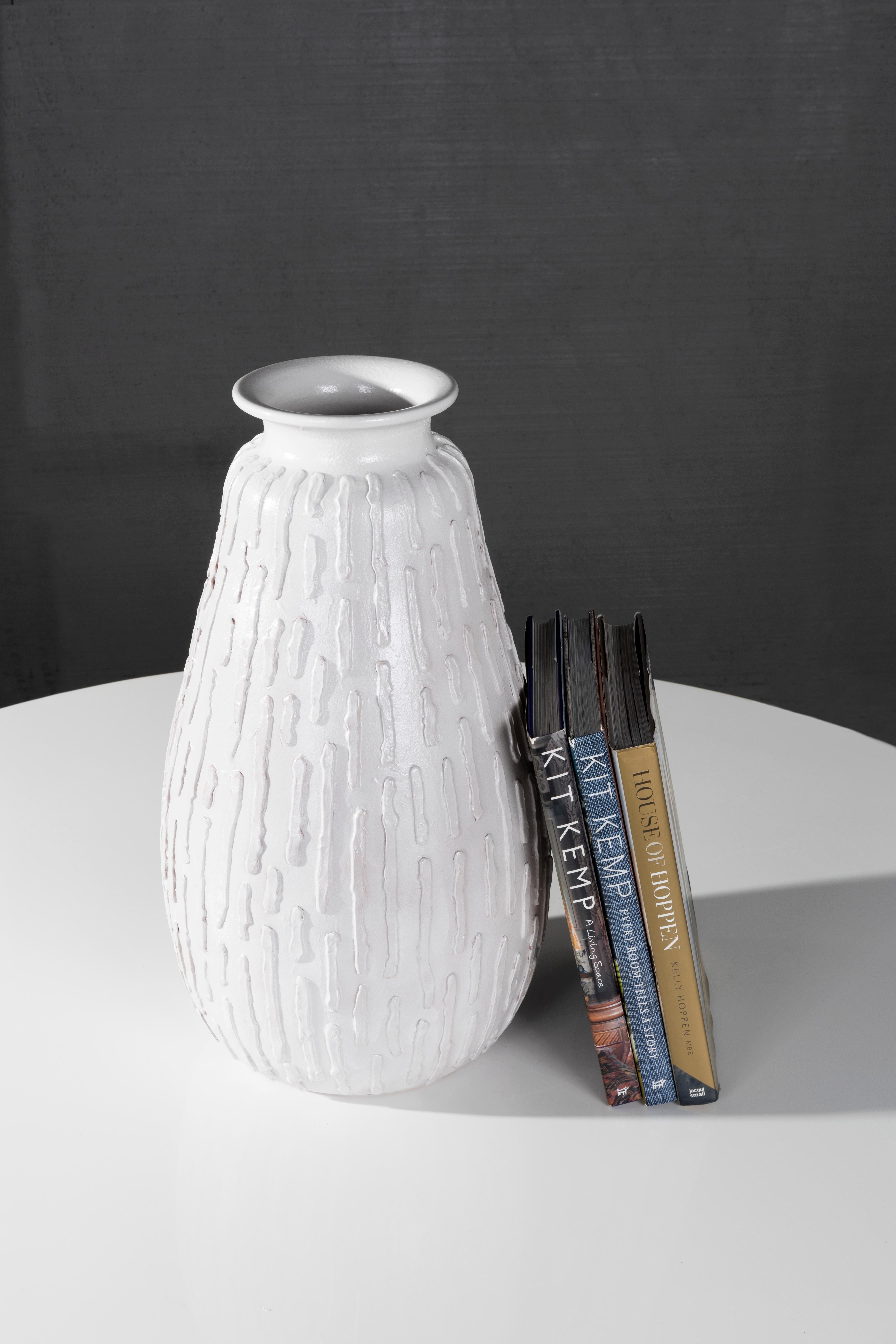 The Ribu Vase, the newest addition to the RENG line, glazed terracotta gourd form vase based off the table lamp which shares its name sake.

All pieces from the RENG line are designed in Dallas, Texas by Brendan Bass. Then a small team of select