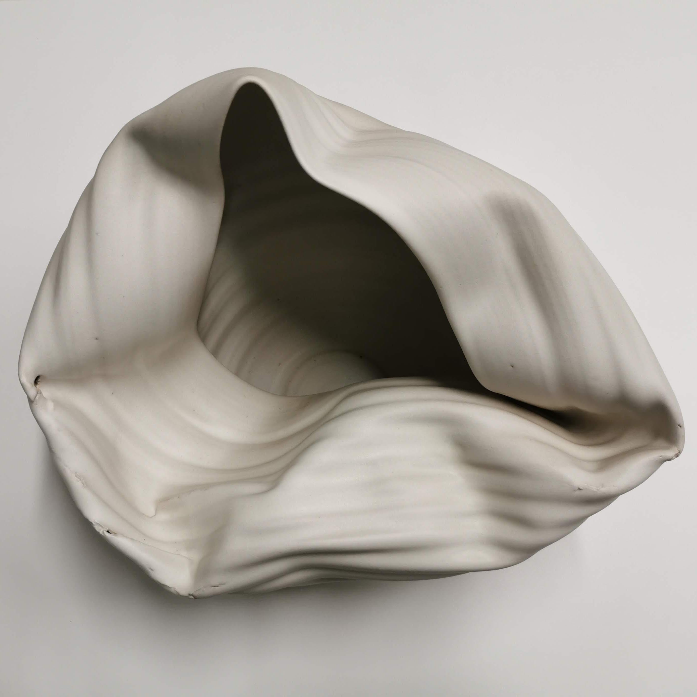 Sumptuous ceramic vessel from ceramic artist Nicholas Arroyave-Portela.

Materials. White St. Thomas clay. Stoneware glazes. Multi fired to cone 9 (1260-1280 degrees)

A VIDEO OF THE PIECE IS AVAILABLE ON DEMAND. PLEASE DO ASK IF YOU WOULD LIKE TO