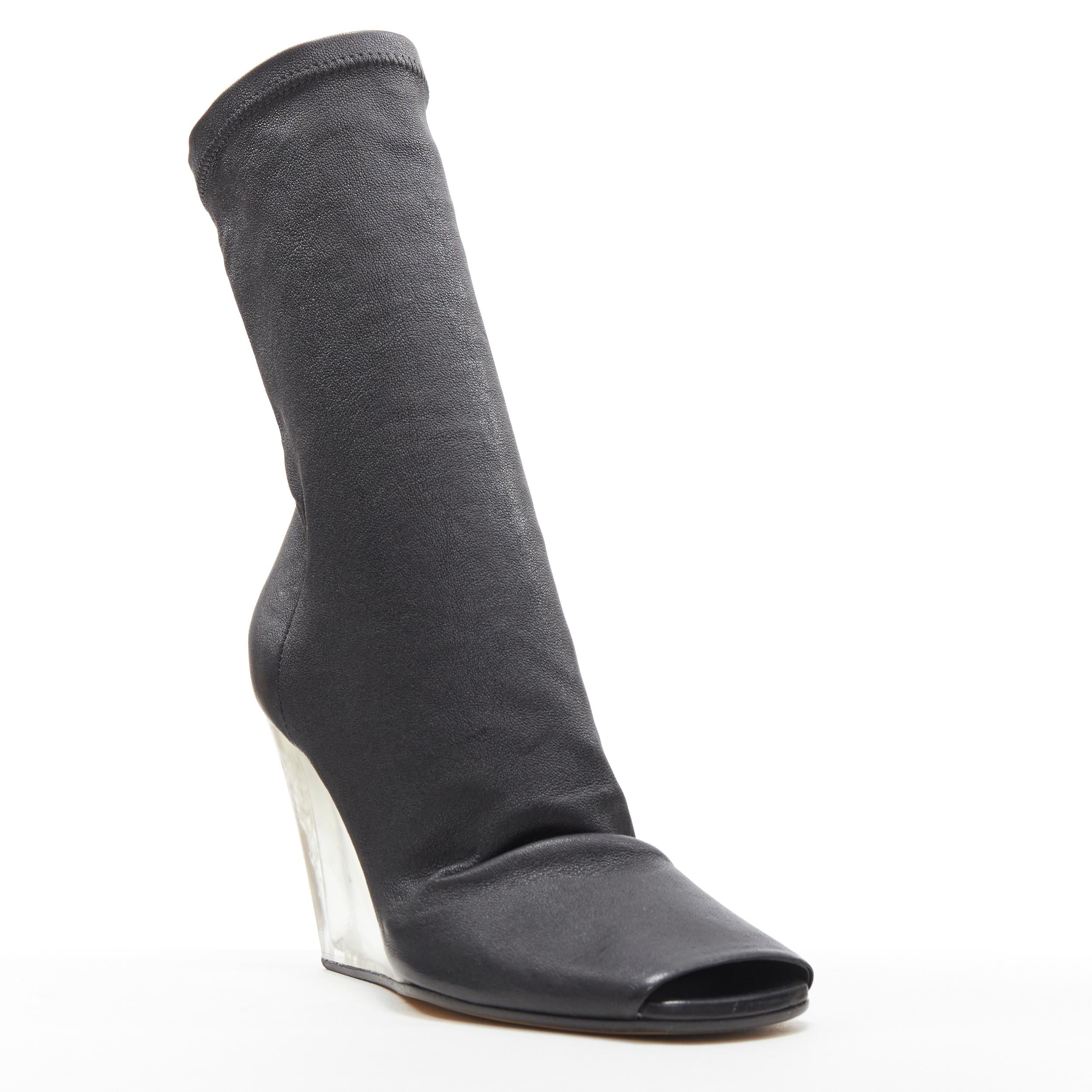 new RICK OWENS black soft leather square slit toe clear wedge sock boot EU37
Brand: Rick Owens
Designer: Rick Owens
Collection: Fall Winter 2018
Model Name / Style: Leather sock boot
Material: Leather
Color: Black
Pattern: Solid
Closure: Pull