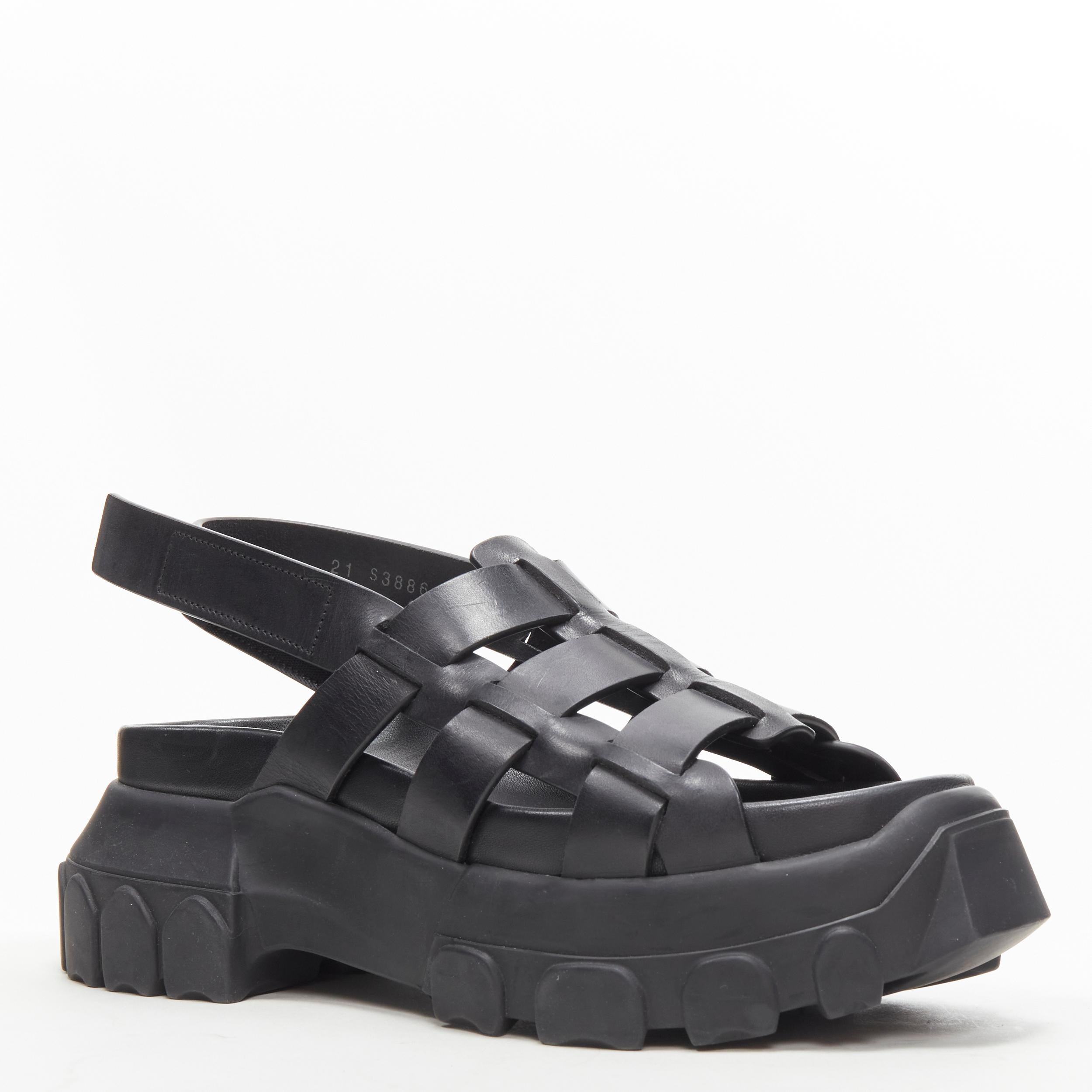 new RICK OWENS Hiking Sandal black track sole platform sandal EU38 
Reference: TGAS/C00633 
Brand: Rick Owens 
Model: Hiking Sandal 
Material: Leather 
Color: Black Pattern: Solid Closure: Magic Tape 
Estimated Retail Price: US $1320 
Made in: Italy