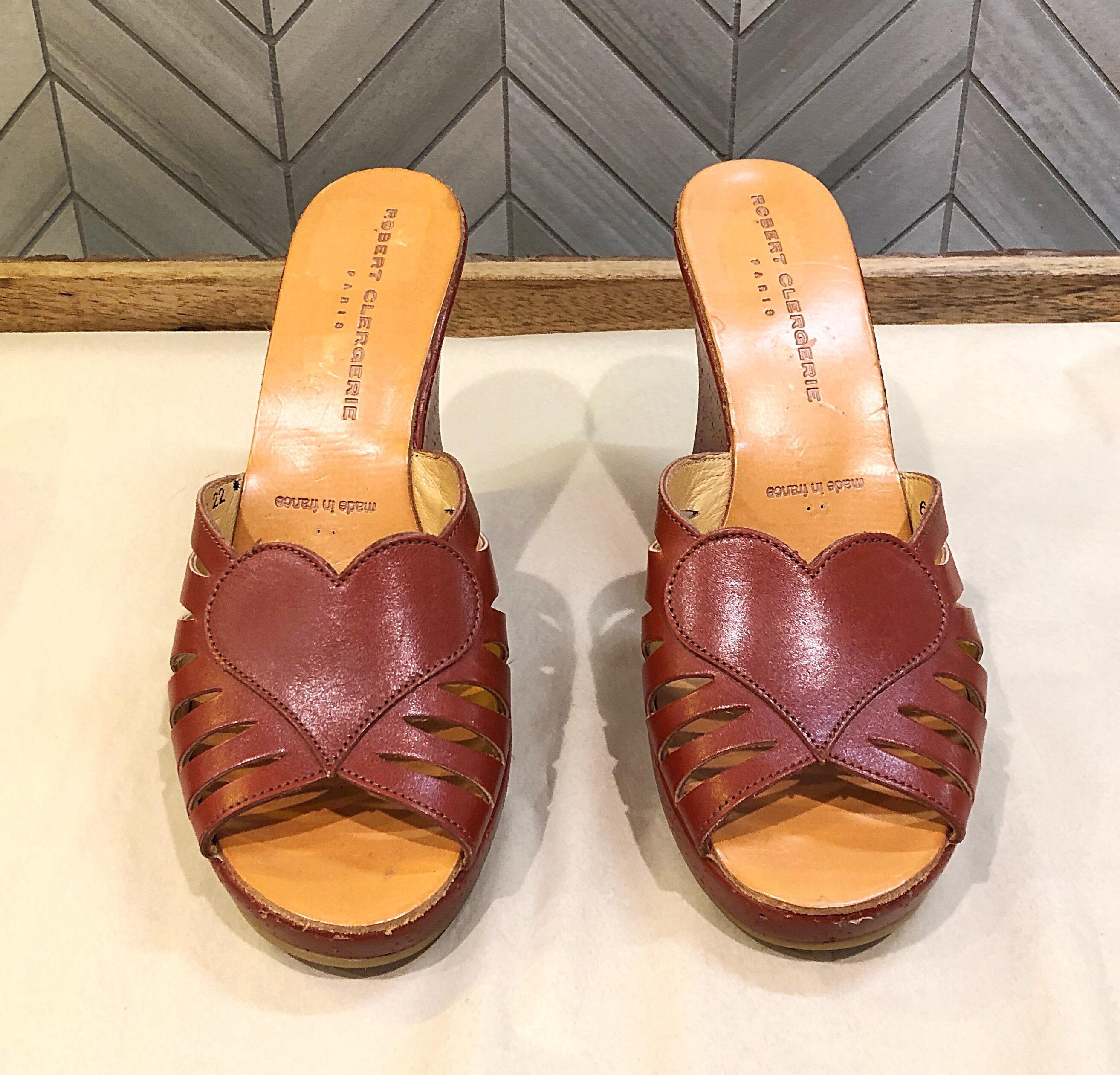 New never worn 90s ROBERT CLERGERIE cordovan / brown Size 6.5 leather wedges! Features a chic heart shape at center foot. Perforated details along the bed of each shoe. Can easily be dressed up or down. Great with jeans, shorts, a skirt or