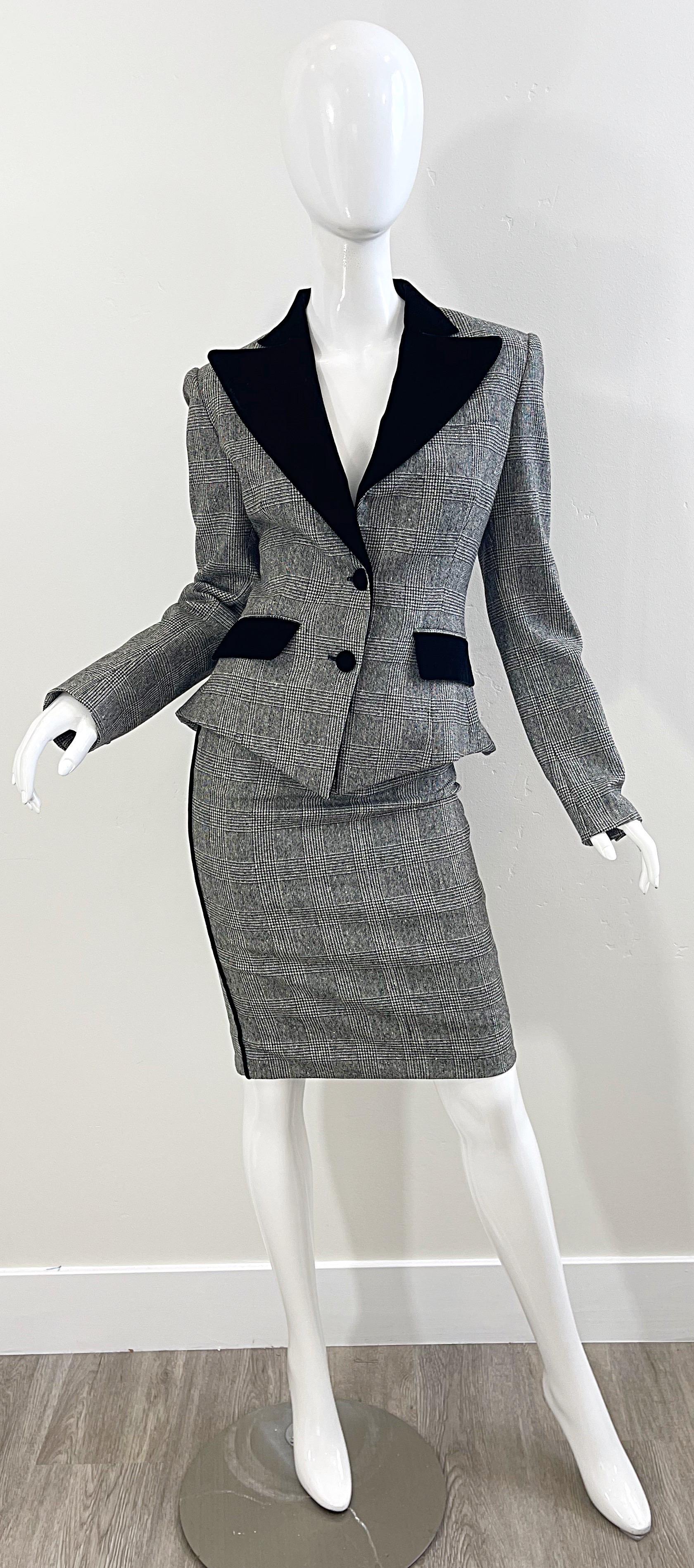 Chic never worn early 2000s ROBERTO CAVALLI black and white houndstooth plaid print wool and velvet skirt suit ! Jacket features a peplum style in the back. Black velvet pocket, buttons, lapels, and down the side of the skirt. Pockets at each side