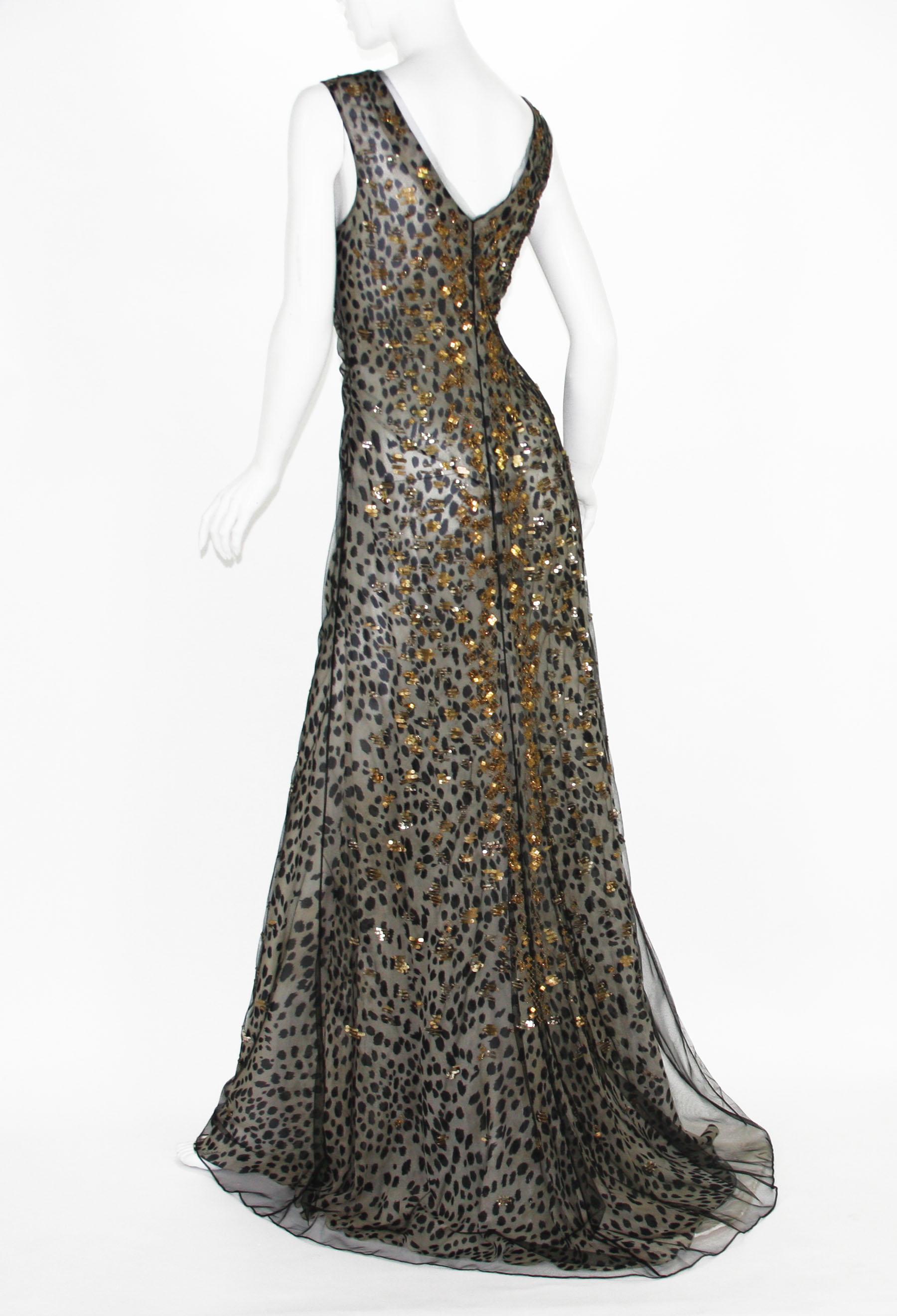 New Roberto Cavalli Silk Embellished Leopard Print Gown
F/W 2017 Collection
Designer size - 44
100% Silk, Black Sheer Net Overlay, Embellished with Gold-tone Beads and Sequins, Side Zip Closure.
Measurements: length - 65 inches, small train, bust -