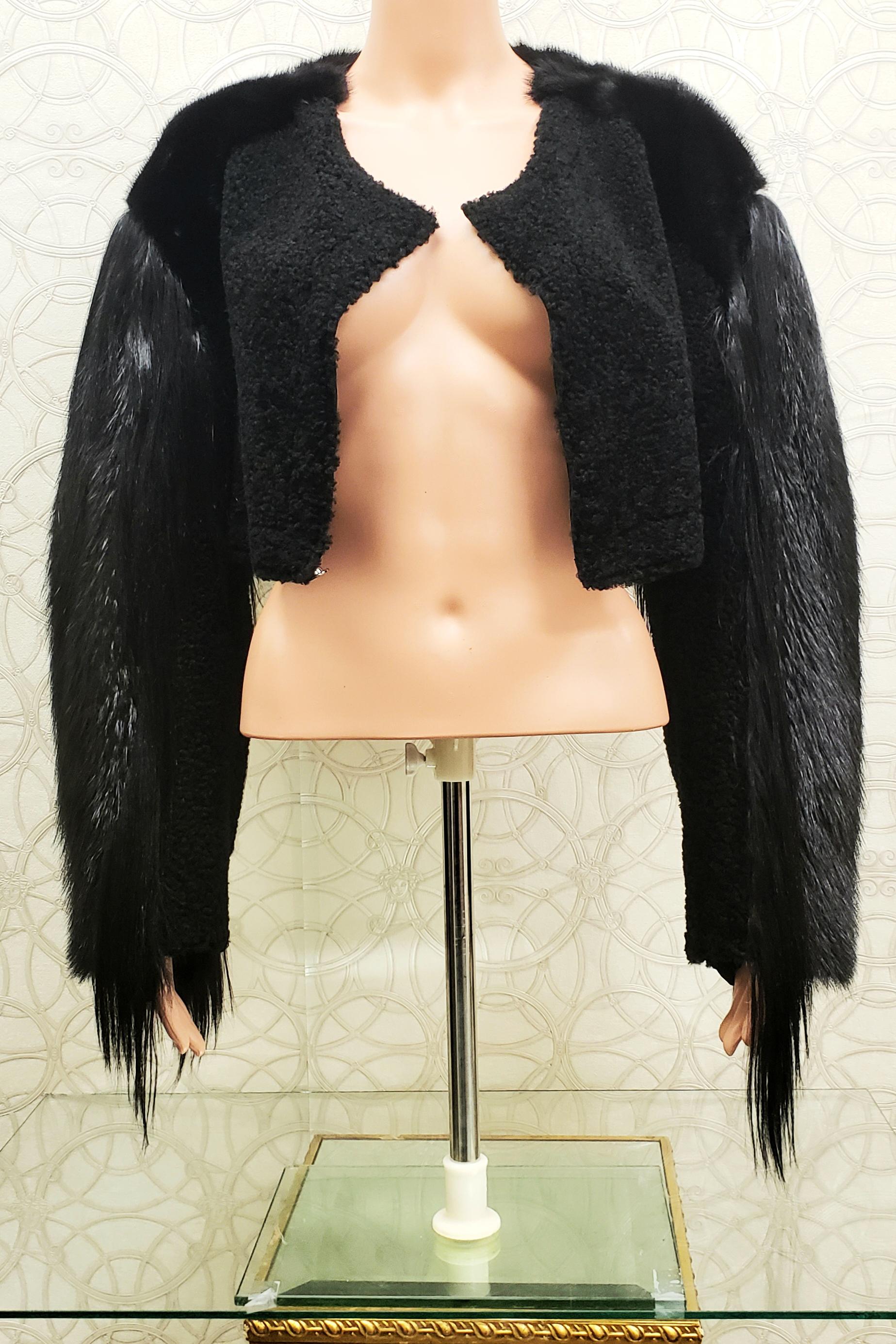 NEW ROBERTO CAVALLI FUR JACKET
Roberto Cavalli's black fur cropped jacket will instantly upgrade your wardrobe with inimitable A-list glamour.
70% Ovis Aries
20% Castor canadensis
5% Mustela Vison
5%  Capra Hircus
Lining 100% silk
Saga Furs
Size 42