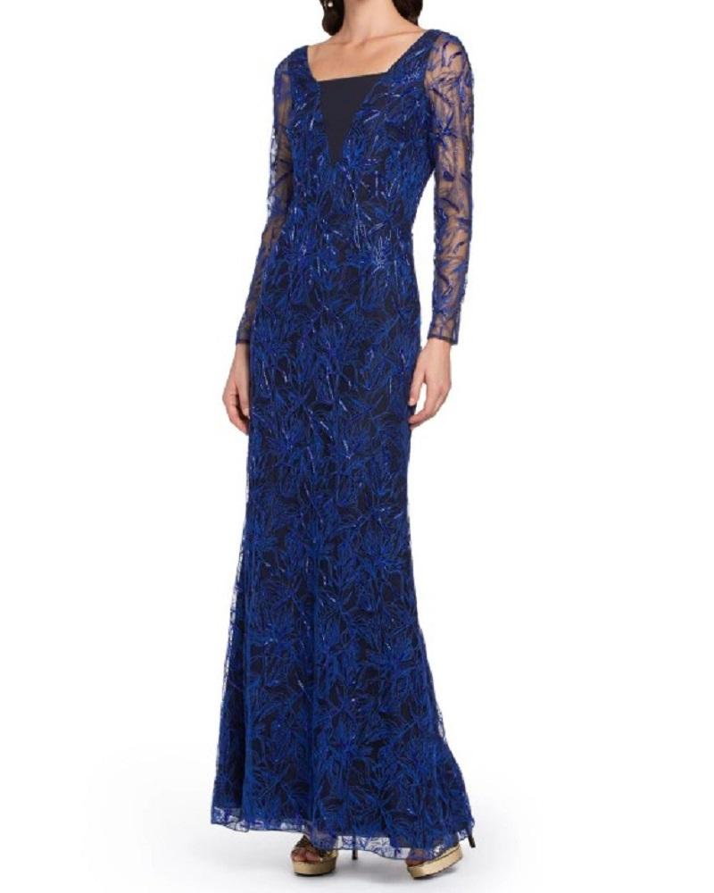 Infused with signature Italian glamour, Roberto Cavalli gowns are in a class of their own. Crafted in Italy, this elegant layered style is no exception, with its sweeping silhouette and beautiful blue lace detailing naturally catching the