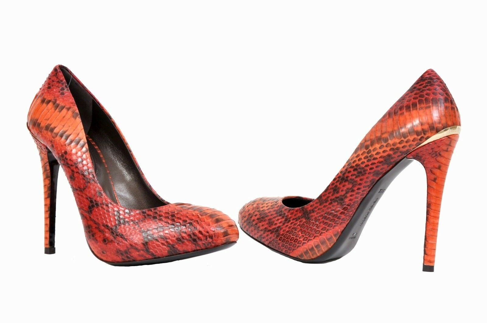 ROBERTO CAVALLI SHOES
Celebrate glamorous times with ROBERTO CAVALLI's chic, high-heeled Elaphe Multicolor Leather  Timbro Shoes.
 

Material: Elaphe Snakeskin Leather
Embellished with Gold Roberto Cavalli Badge
 Heel measures 5 