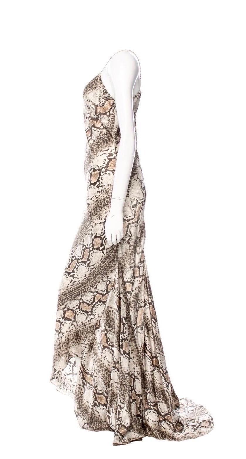 A beautiful ROBERTO CAVALLI evening gown that will last you for years
From the most prestigious ROBERTO CAVALLI main line
Made out of most beautiful fabric with exotic snakeskin animal print
Fabric is discreetly signed with 