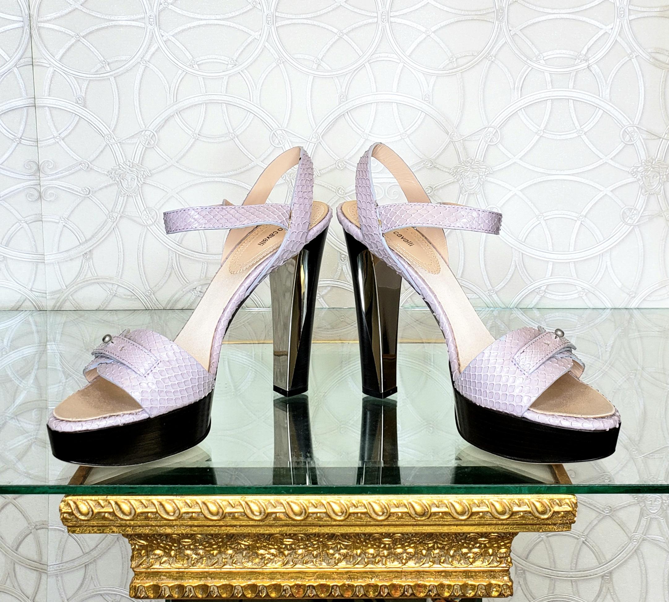 ROBERTO CAVALLI SHOES
Celebrate glamorous times with ROBERTO CAVALLI's chic, high-heeled platforms.
 
Color: Lavender
Material: Genuine snakeskin
 Heel measures 5 1/2