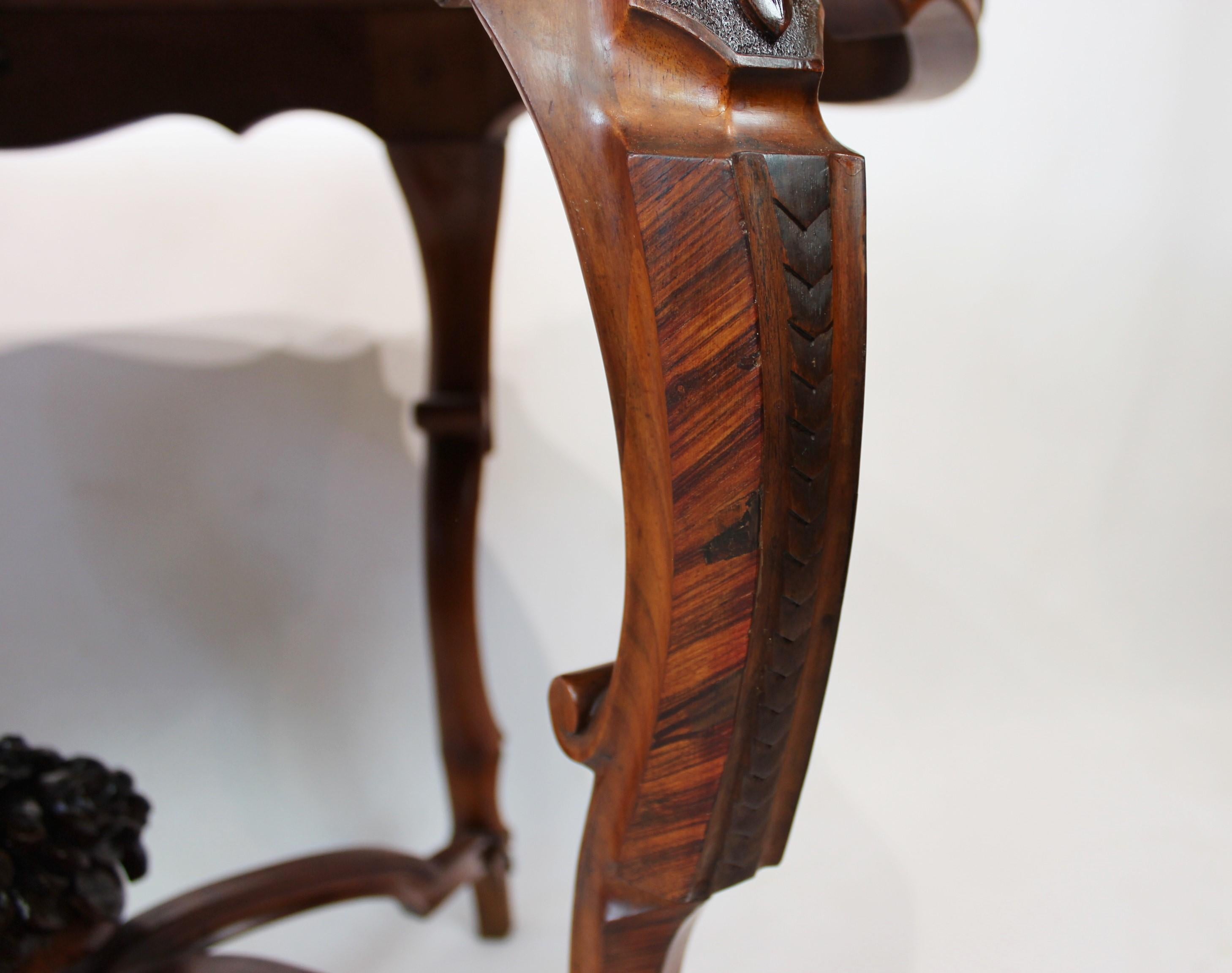 Late 19th Century New Rococo Pedestal Table of Walnut with Carvings and Inlaid Intarsia, 1880s