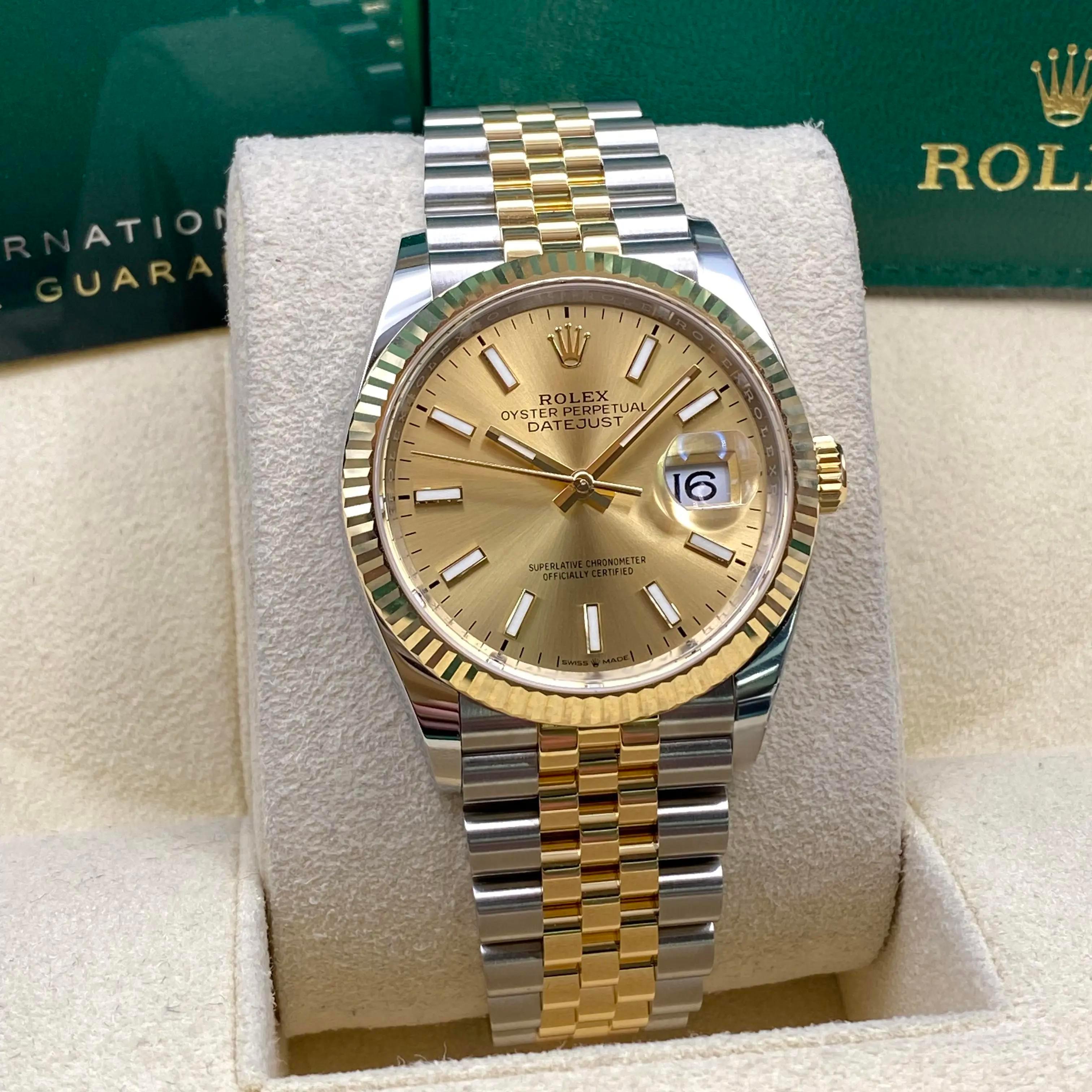 Unworn. Comes with the original box and papers.