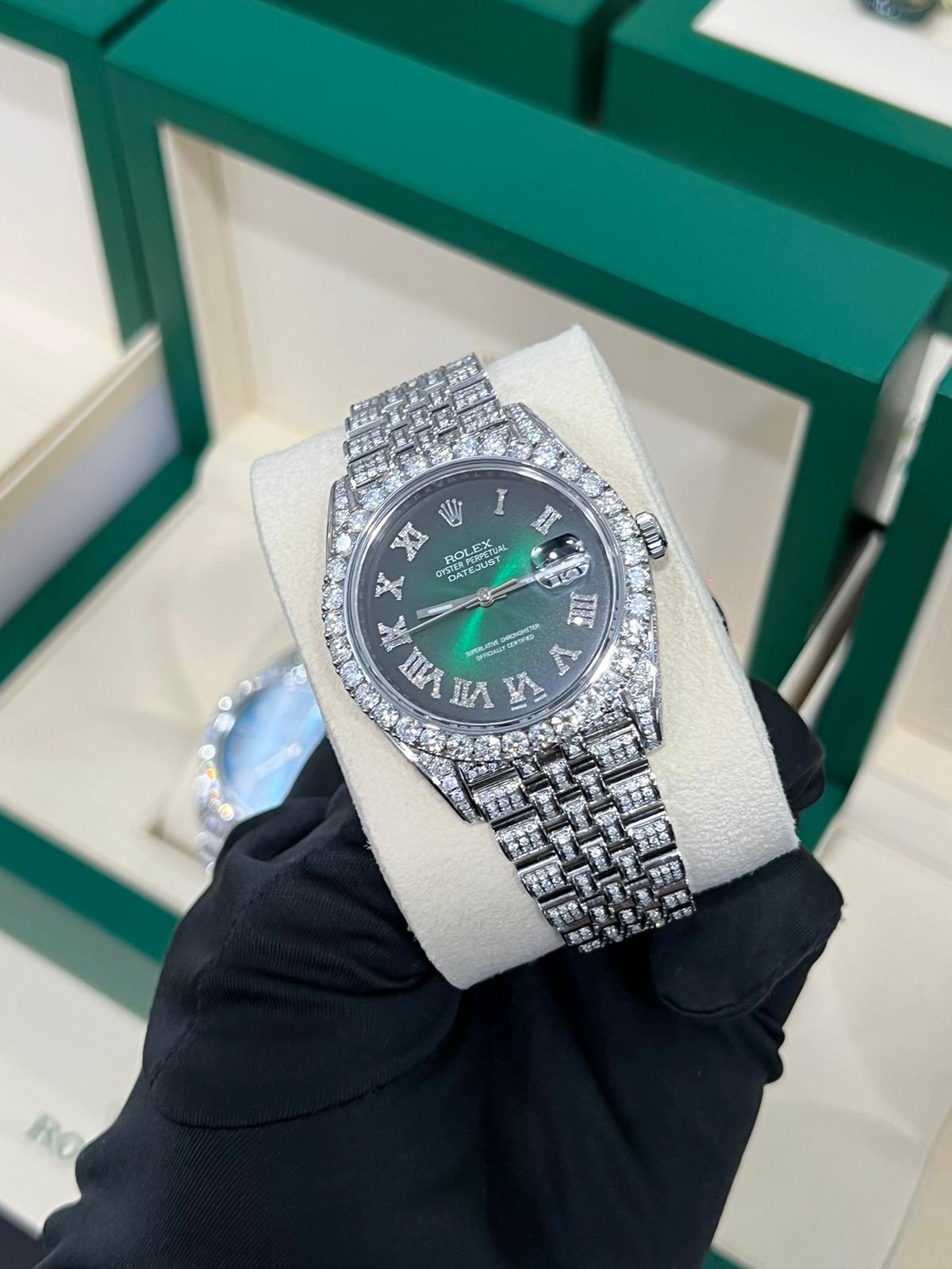 A Beautifully Customized Pave Diamond Dial Datejust 41mm Watch with Roman Numerals!!! This Watch Has Been Set Wonderfully and Is Fully Iced Out! the Diamonds Are Top Quality and the Watch Comes with Box and Papers.
Model number: 126300
Movement: