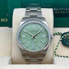 NEW Rolex Oyster Perpetual 41mm 134300 Steel Pistachio Dial Watch Box Papers