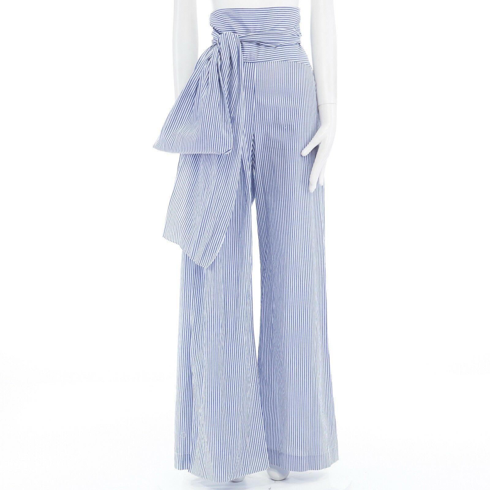 new ROSIE ASSOULIN AW16 blue white pinstripe cotton highwaist sash wide pant US6
ROSIE ASSOULIN
FROM THE FALL WINTER 2016 COLLECTION
Cotton . 
Blue and white shirting cototn . 
High waisted . 
Concealed zip side closure .
Attached self tie sash