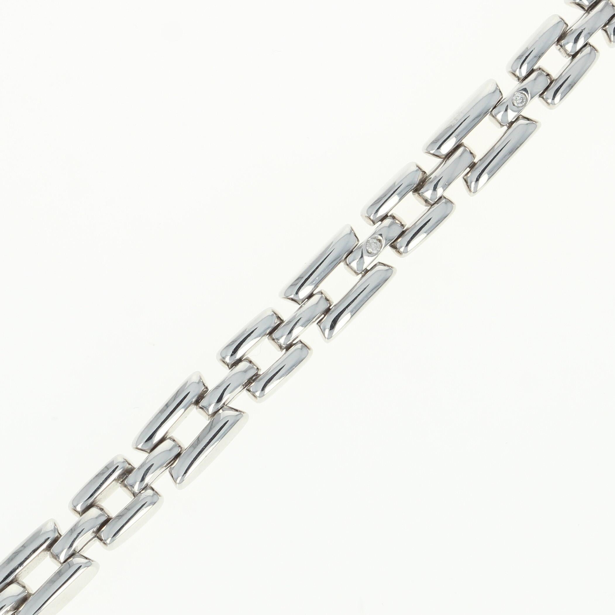 Metal Content: Guaranteed Sterling Silver as stamped
 
 Stone Information:
 Natural Diamonds - 
 (three small accents)
 Cut: Round
 
 Chain Style: Fancy Link 
 Chain: length 6 1/2