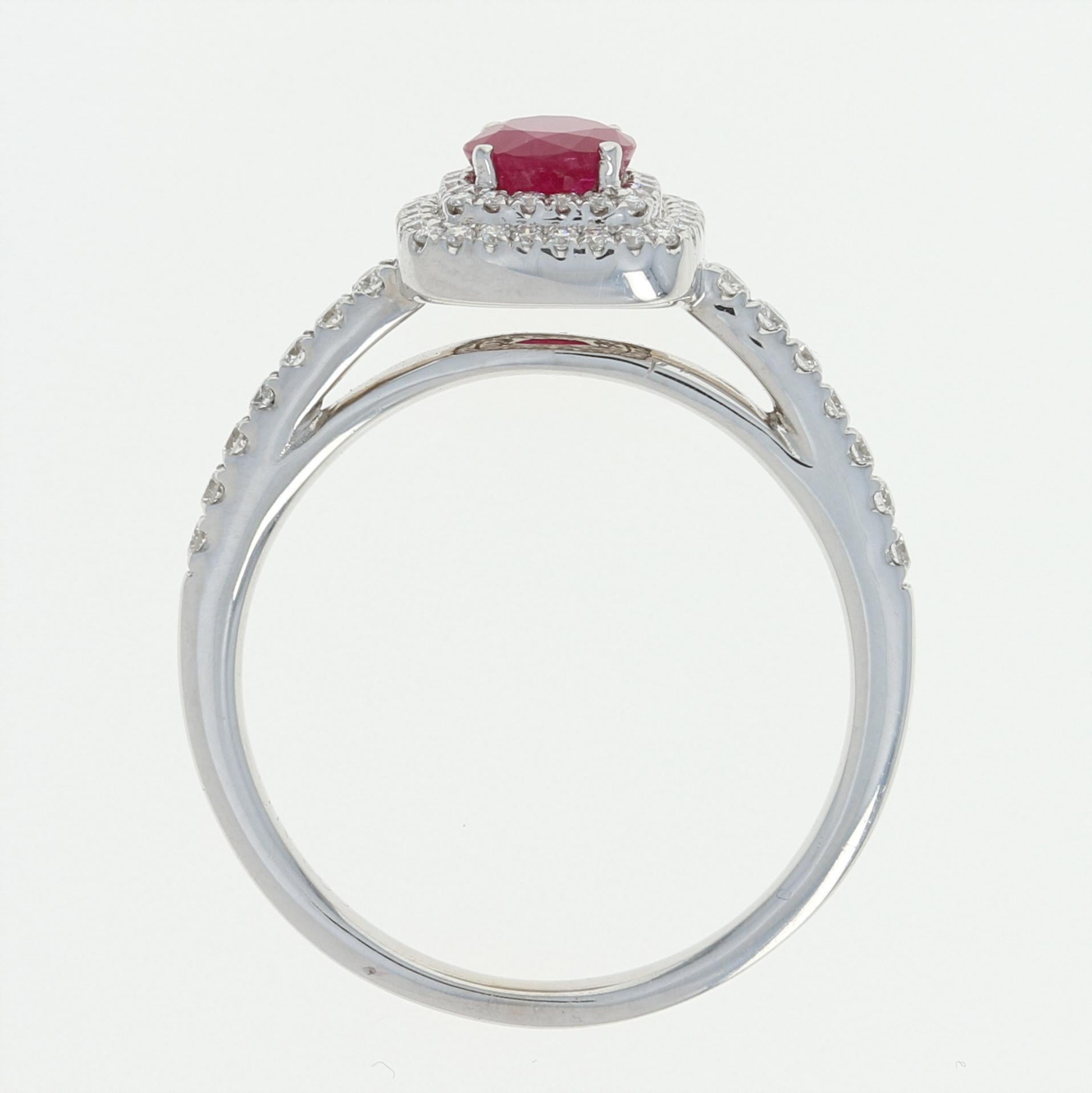 Ruby and Diamond Halo Ring, 14 Karat White Gold Round Cut .80 Carat In New Condition In Greensboro, NC