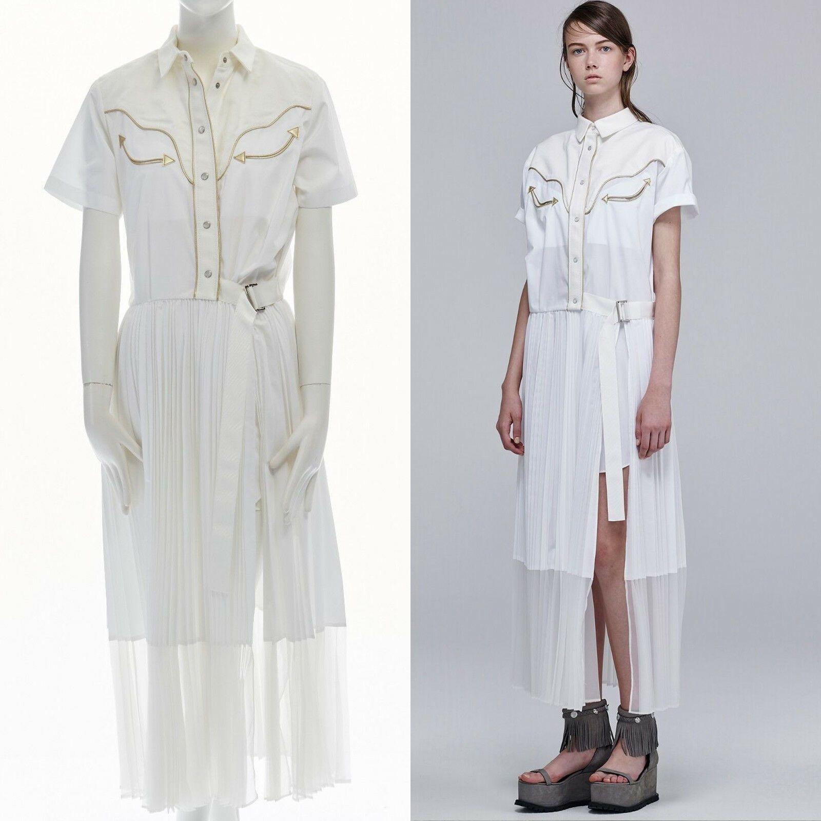 new SACAI Resort 2016 white star western shirt pleated belted cotton dress JP2 M
SACAI BY CHITOSE ABE
AS SEEN ON: RESORT 2016 LOOKBOOK
COTTON, LINEN, POLYESTER, POLYURETHANE. 
WHITE COTTON. 
WESTERN INSPIRED GOLD LEATHER BONDING ALONG PLACKET AND