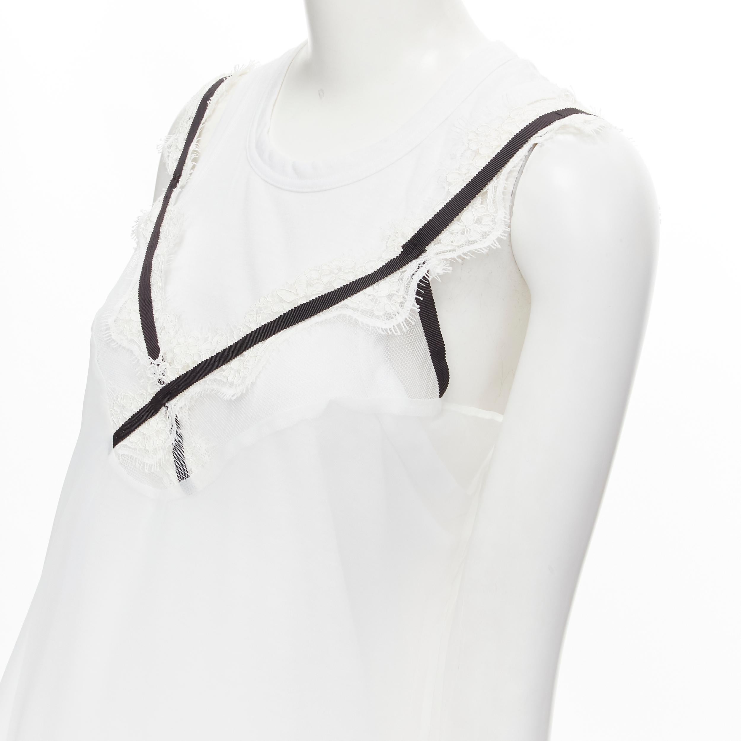new SACAI white cotton tank layered sheer lace trimmed slip dress JP2 M 
Reference: MELK/A00099 
Brand: Sacai 
Designer: Chitose Abe 
Material: Polyester 
Color: White 
Pattern: Solid 
Made in: Japan 

CONDITION: 
Condition: New with tags. 
Comes