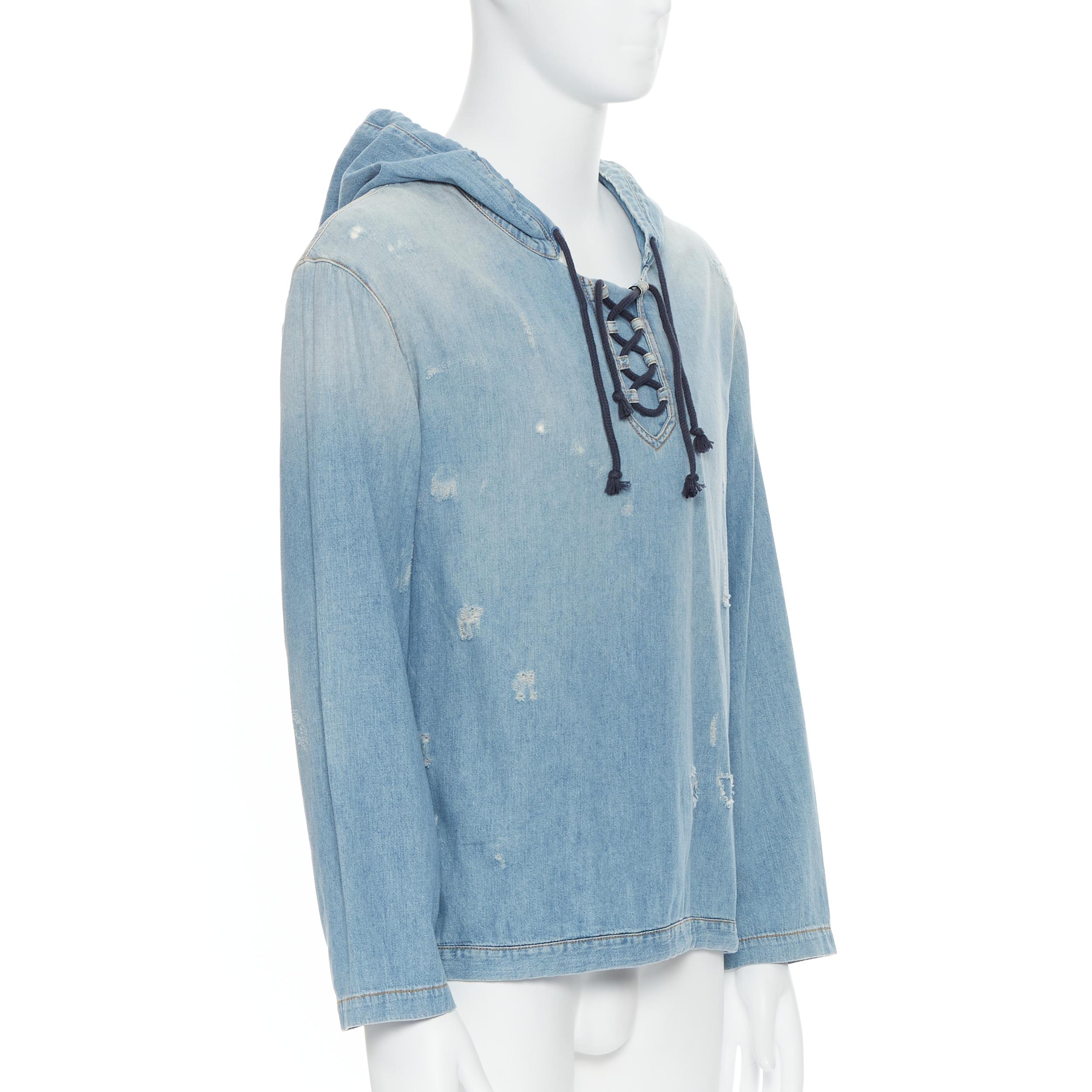 new SAINT LAURENT 2018 distressed destroyed denim lace up hoodie pullover S 
Reference: TGAS/B00609 
Brand: Saint Laurent 
Designer: Anthony Vacarello 
Collection: 2018 
Material: Denim 
Color: Blue 
Pattern: Solid 
Extra Detail: Blue washed light