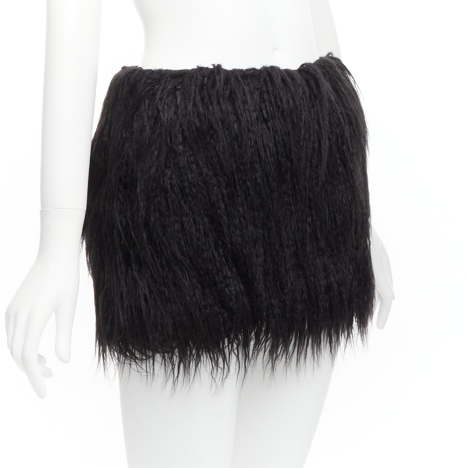 new SAINT LAURENT 2021 Runway black faux fur mini skirt FR34 XS
Reference: TGAS/D00741
Brand: Saint Laurent
Designer: Anthony Vaccarello
Collectiaon: 2021 - Runway
Material: Faux Fur
Color: Black
Pattern: Solid
Closure: Snap Buttons
Lining: Black