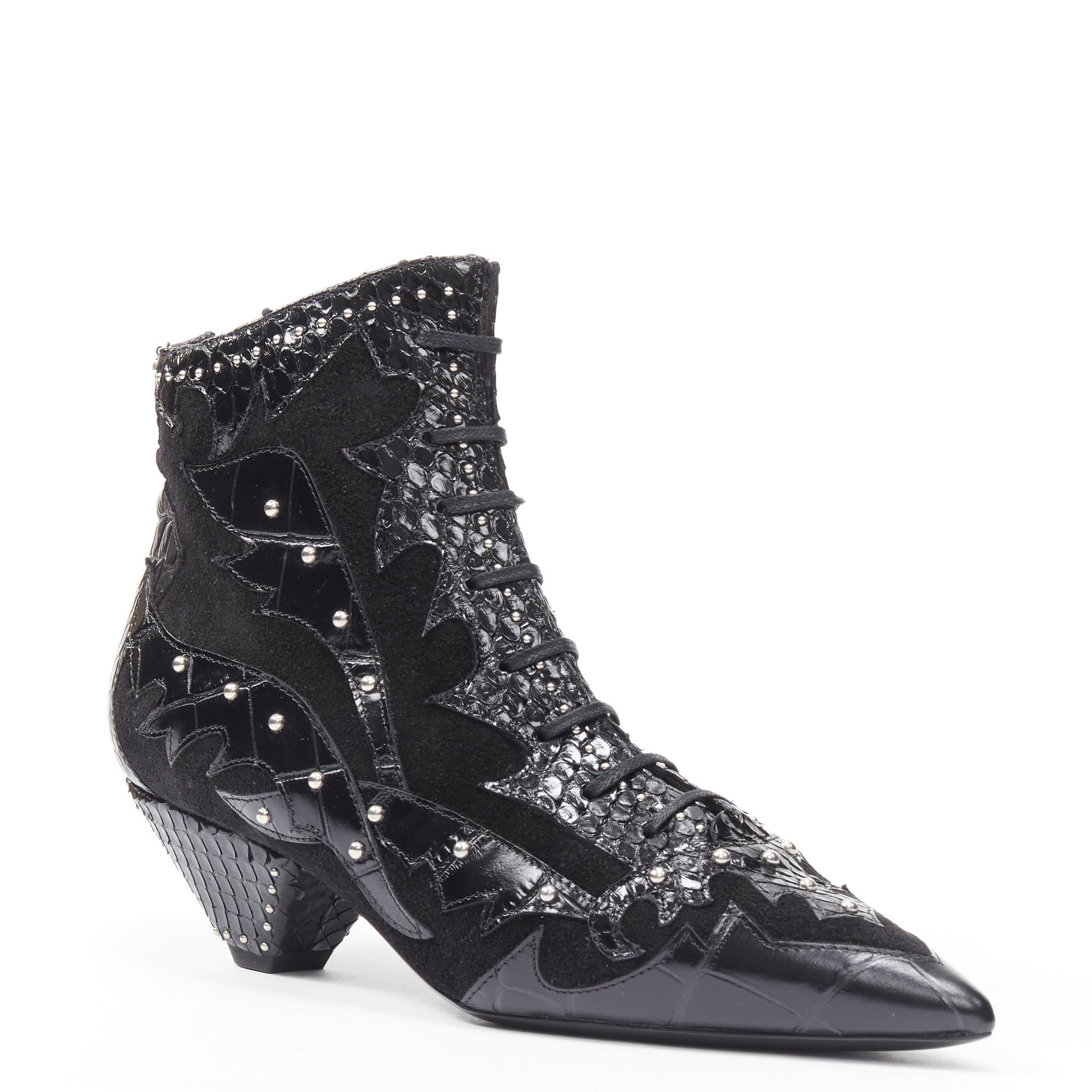 new SAINT LAURENT Blaze 45 black western snake suede studded ankle bootie EU37 
Reference: TGAS/B01769 
Brand: Saint Laurent 
Material: Suede 
Color: Black 
Pattern: Solid 
Closure: Lace Up 
Extra Detail: Blaze 45. Black suede with snakeskin leather