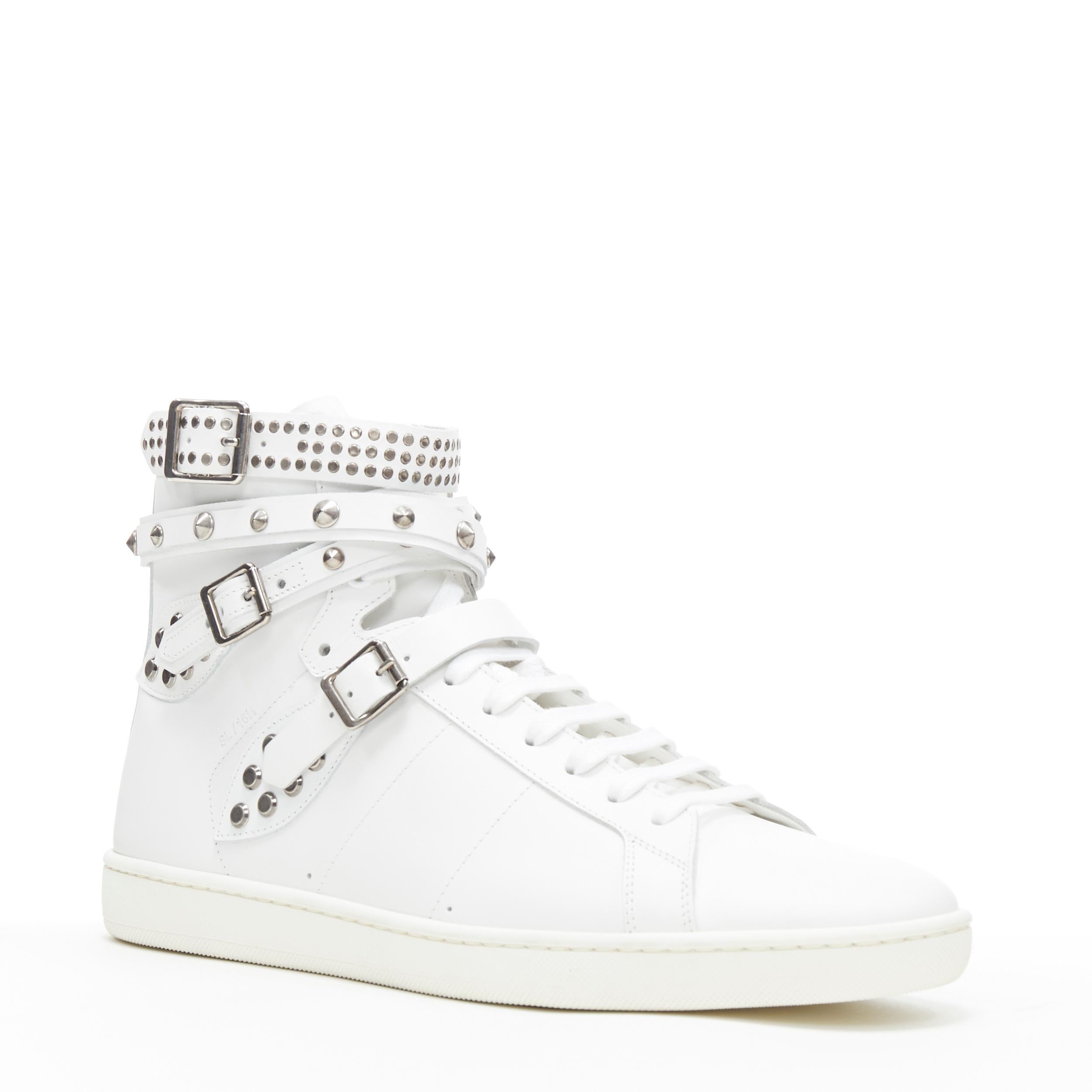 new SAINT LAURENT Court Classic SI16H white silver stud high top sneaker EU42
Brand: Saint Laurent
Model Name / Style: High top
Material: Silver
Color: White
Pattern: Solid
Closure: Lace up
Extra Detail: Court Classic SI16H High top  Round Toe.
Made