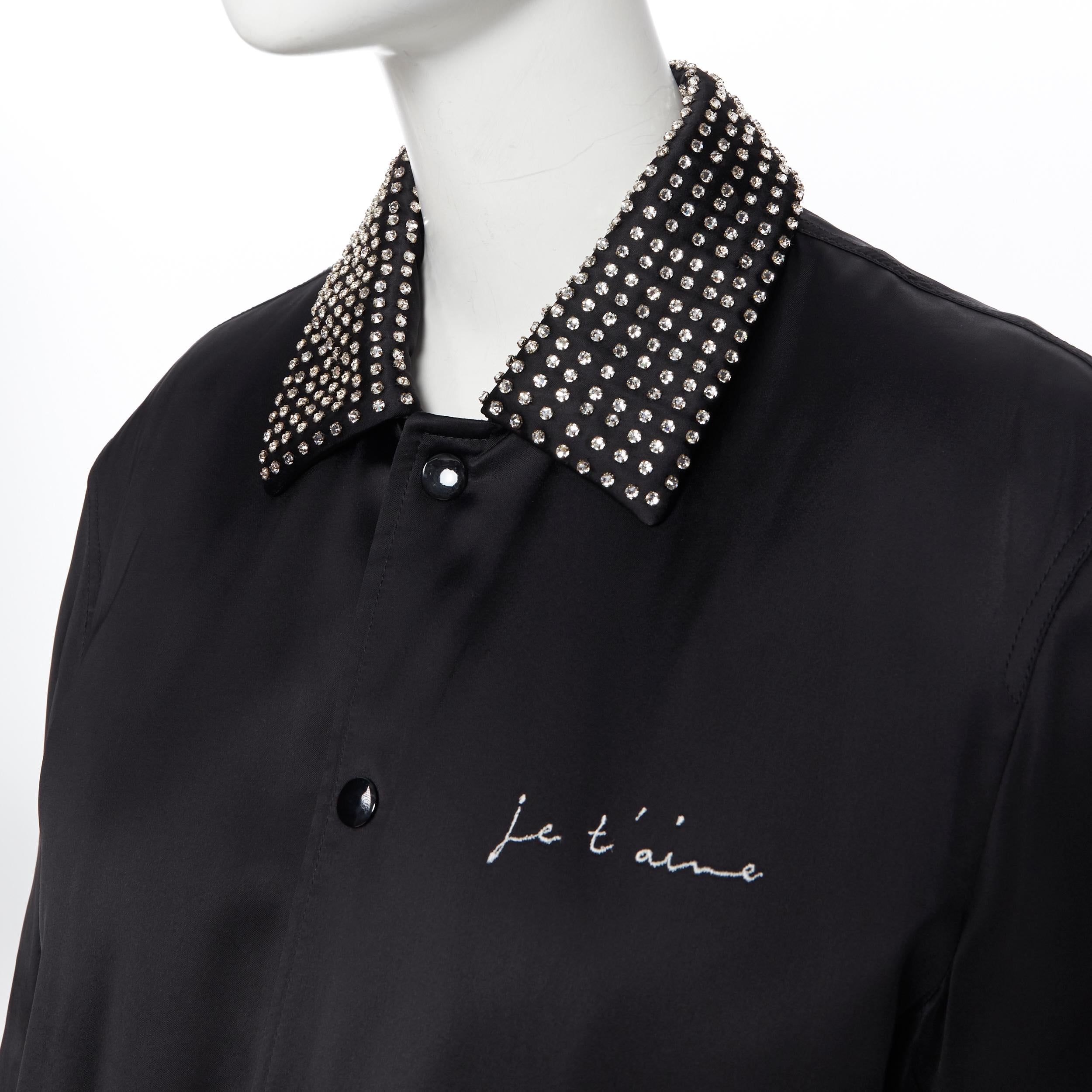 new SAINT LAURENT Je T'aime Teddy black satin crystal collar bomber jacket FR34 
Reference: TGAS/A05625 
Brand: Saint Laurent 
Designer: Anthony Vaccarello 
Material: Viscose 
Color: Black 
Pattern: Solid 
Closure: Snap 
Extra Detail: Crystal