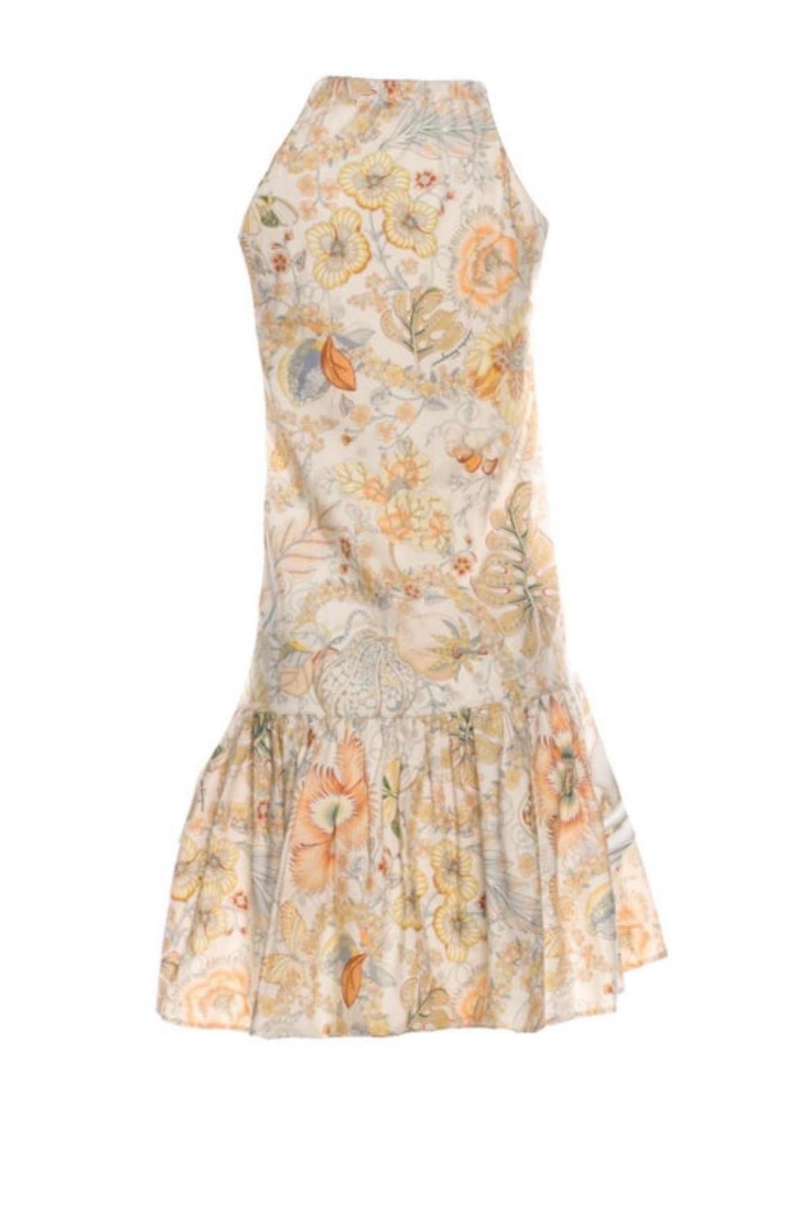 Stunning cocktail dress by Salvatore Ferragamo
Wonderful floral print all over
Closes with bow
