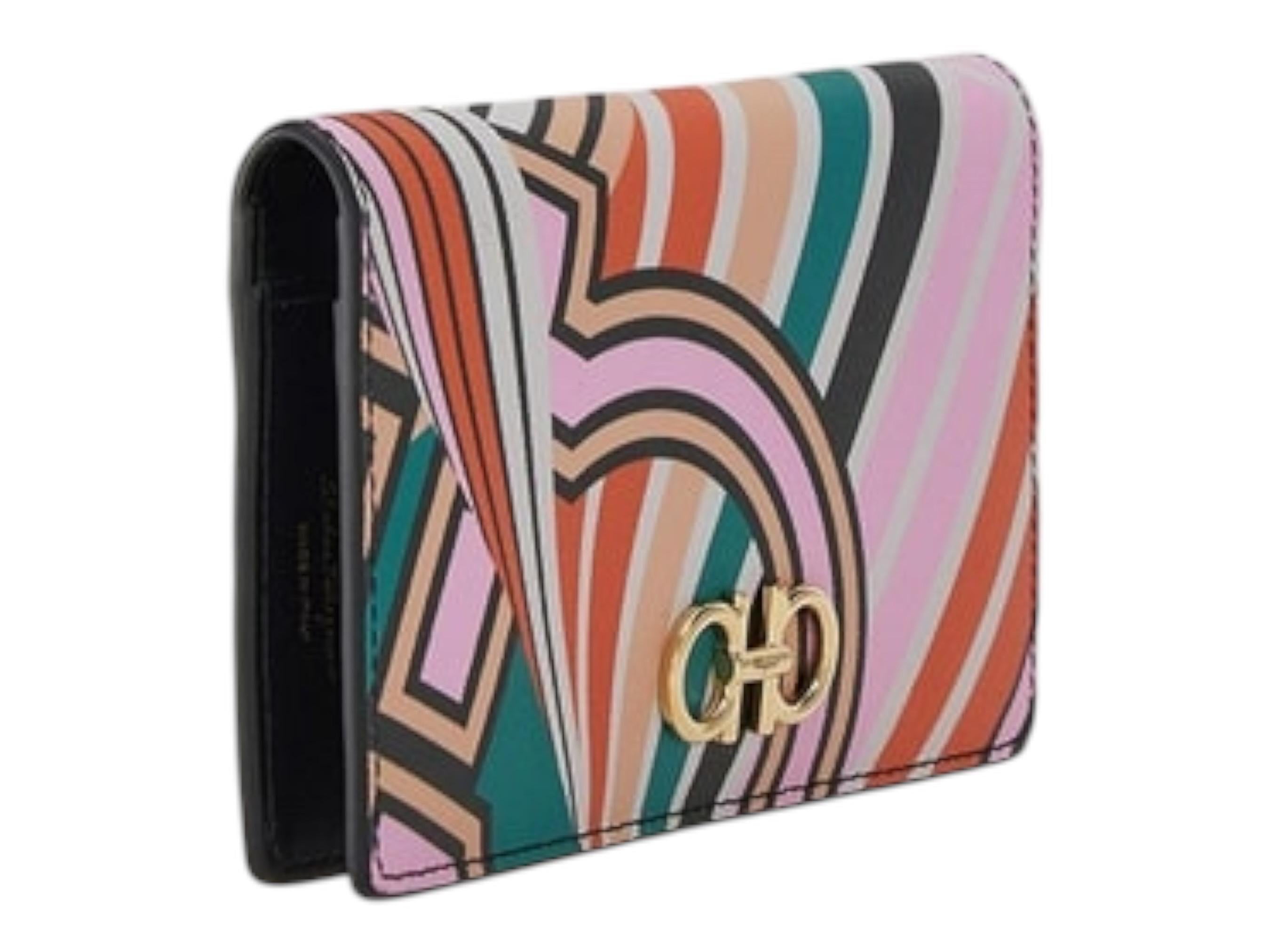 Effortless elegance and statement detailing meet in this large wallet by Salvatore Ferragamo. This fantastic colors were produced in a limited edition.

This stunning piece is adorned with a gold-tone Gancini buckle. The spacious interior boasts