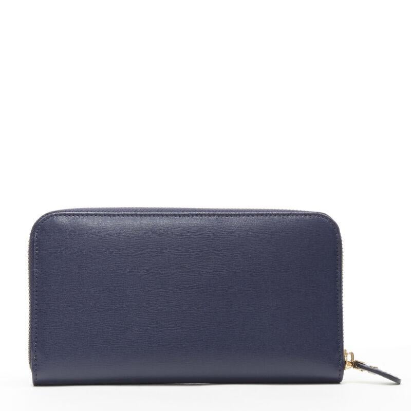 new SALVATORE FERRAGAMO navy blue deboss logo zip around continental long wallet
Brand: Salvatore Ferragamo
Model Name / Style: Long wallet
Material: Leather
Color: Blue
Pattern: Solid
Closure: Zip
Made in: Italy

CONDITION: 
Condition: New without