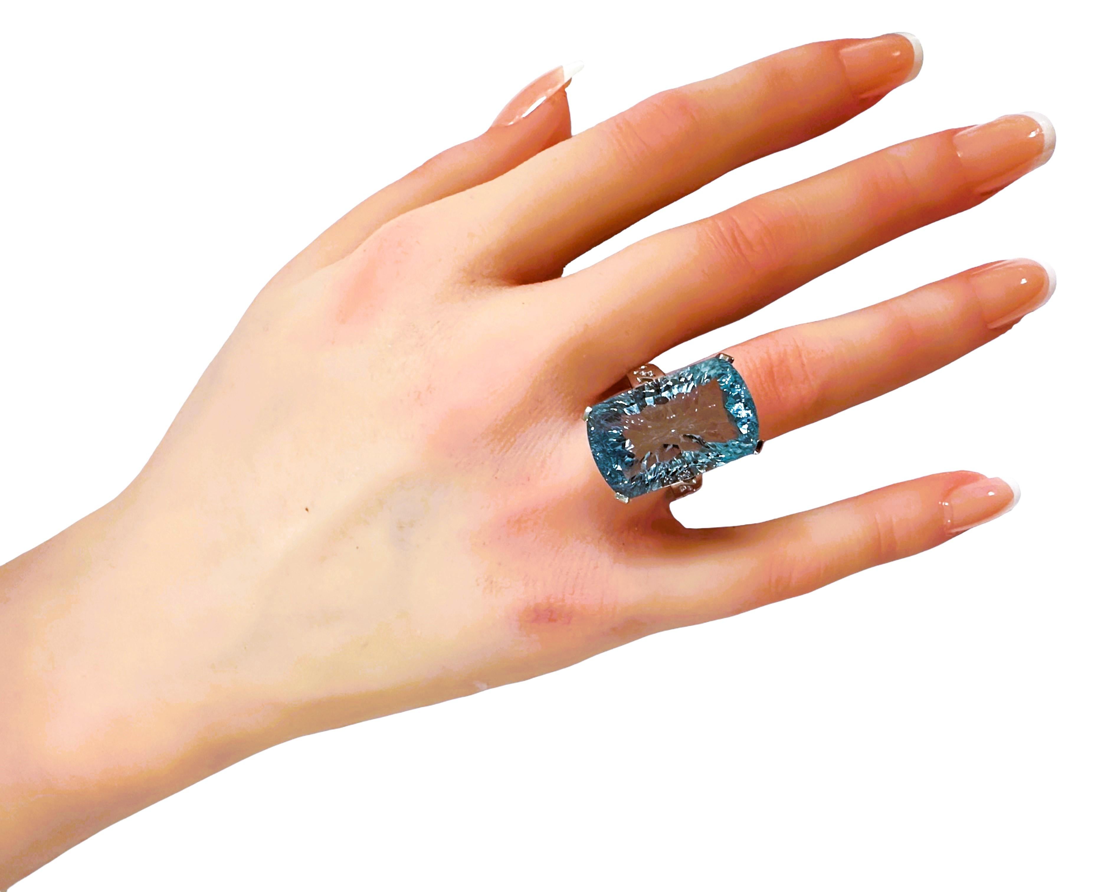 What a beautiful ring!  The cut of this ring is just spectacular!  The ring is a size 6.25. This stone is from Brazil.  It is a beautiful fancy radiant concave cut stone and is 19.20 cts.  It's a very high quality stone.  It measures 21 x 13.2 mm