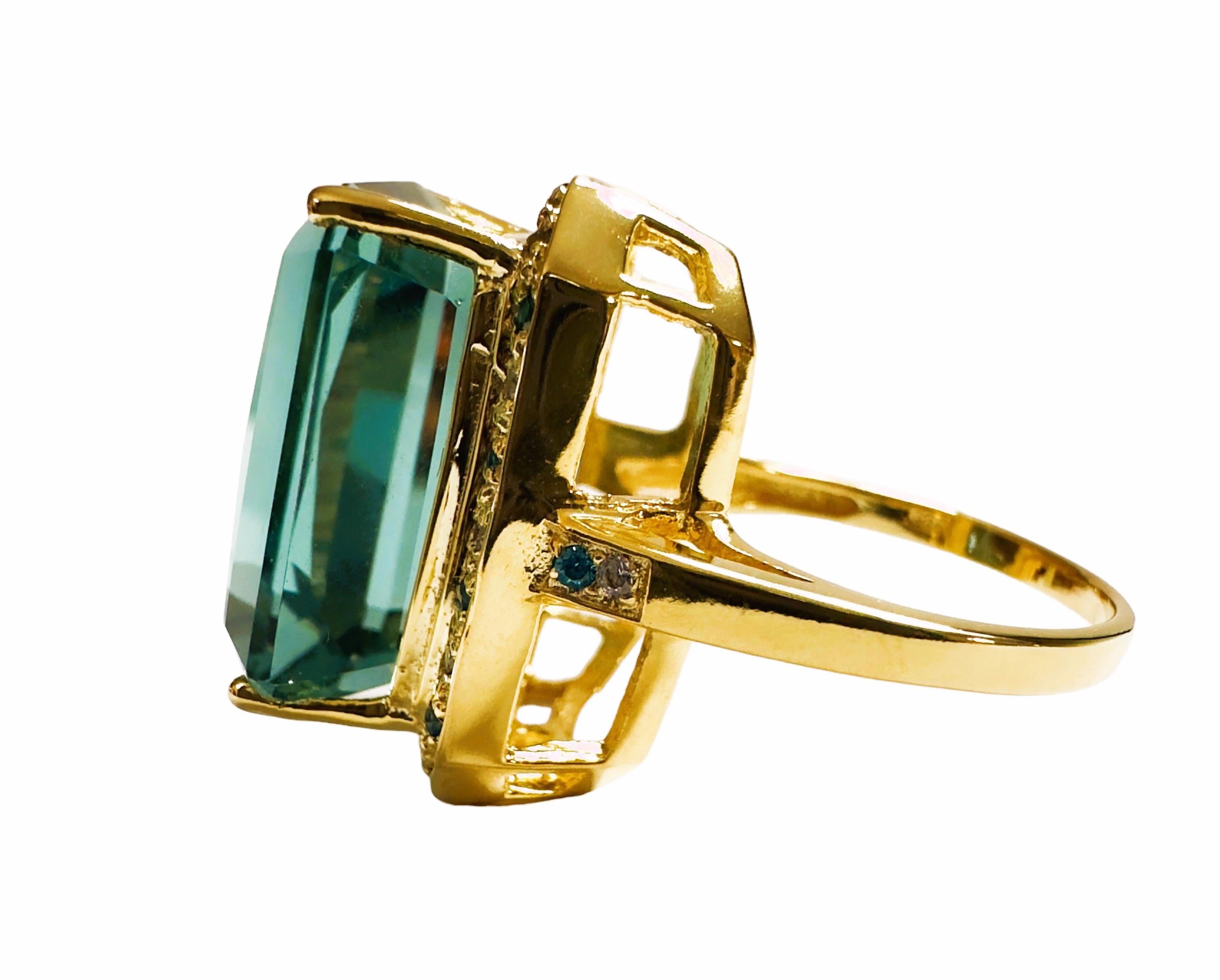 What a beautiful ring!  The cut of this stone is just spectacular!  The ring is a size 6.25. This stone is from the Philippines. It is a beautiful Emerald cut stone and is 25 cts.  It's a very high quality stone.  The 