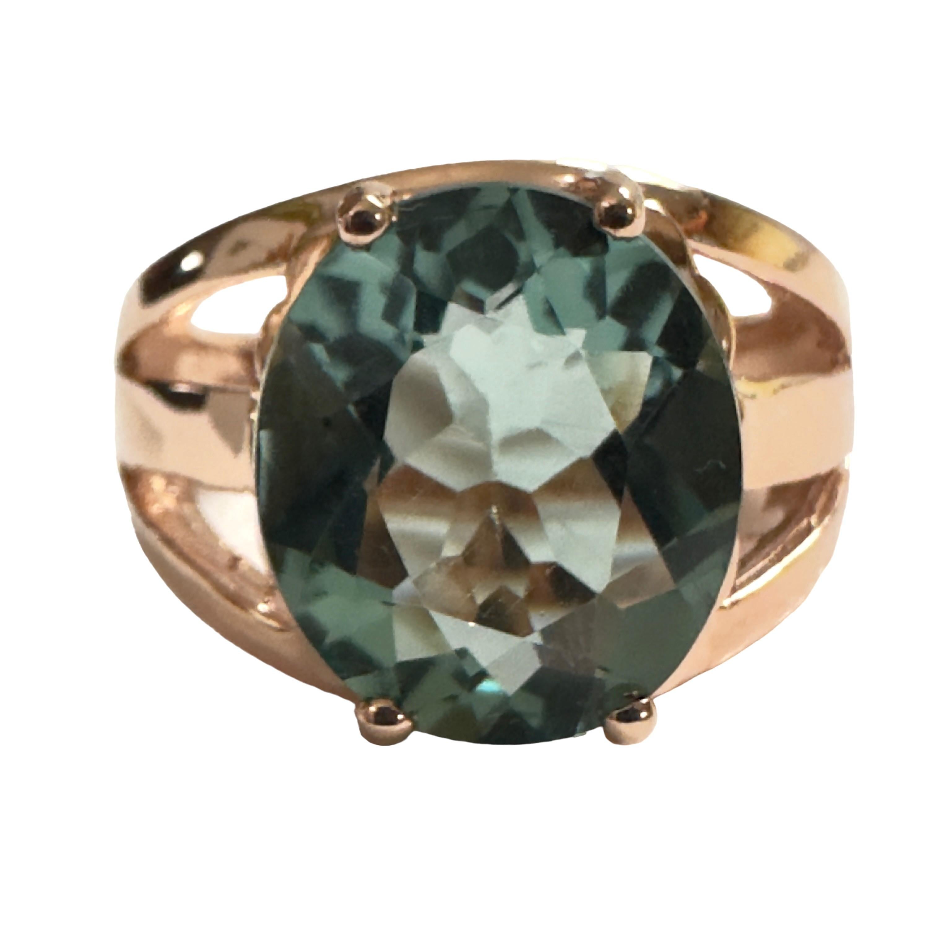 What a beautiful ring!  The ring is a size 6.5. This stone is from the Philippines. It is a beautiful oval cut stone and is 5.80 cts.  It's a very high quality stone.  The 