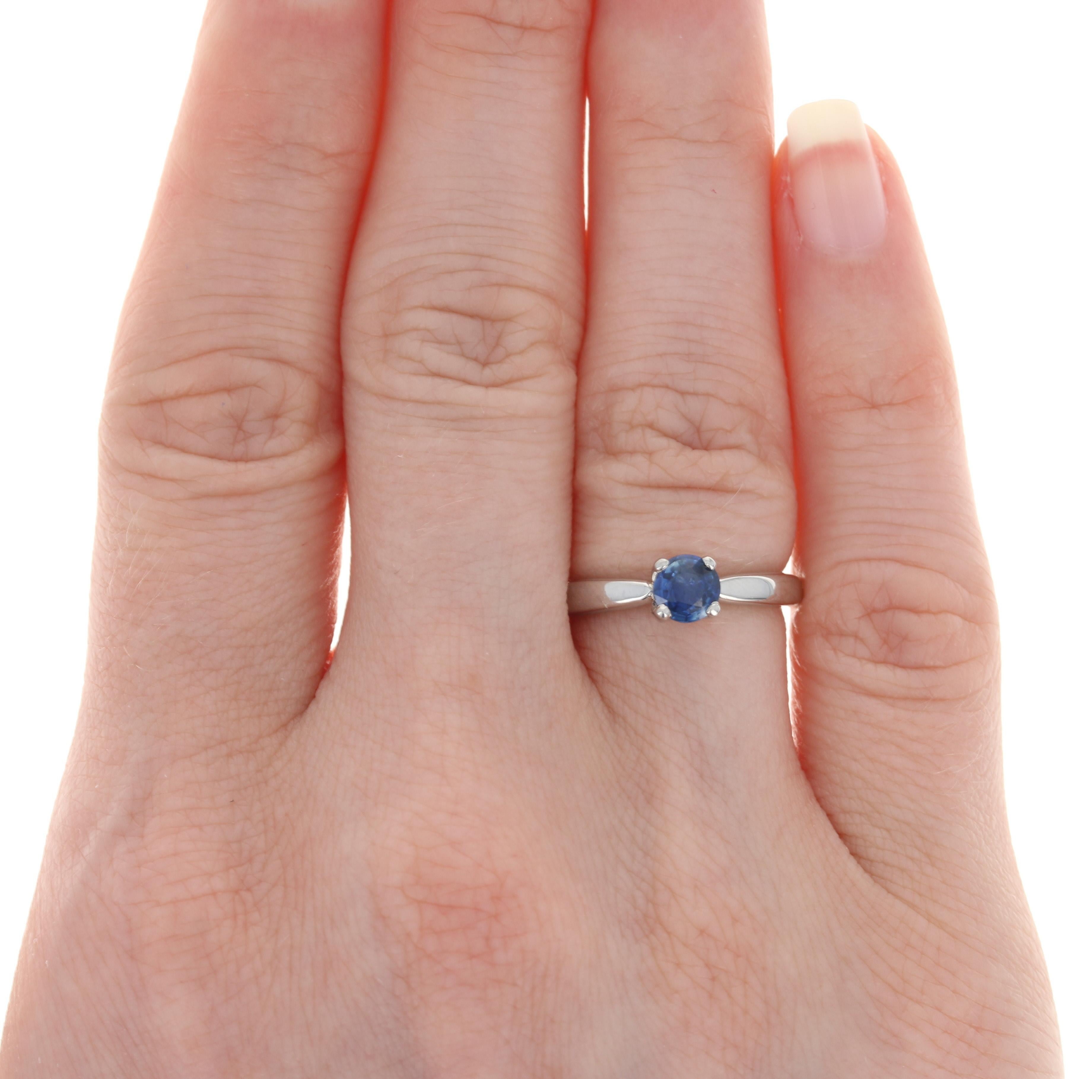 As uniquely beautiful as your romance, this radiant NEW engagement ring will be the perfect choice for your bride-to-be! This 950 platinum ring is fashioned in a classic Tiffany-style design graced by a sumptuous blue sapphire solitaire that will