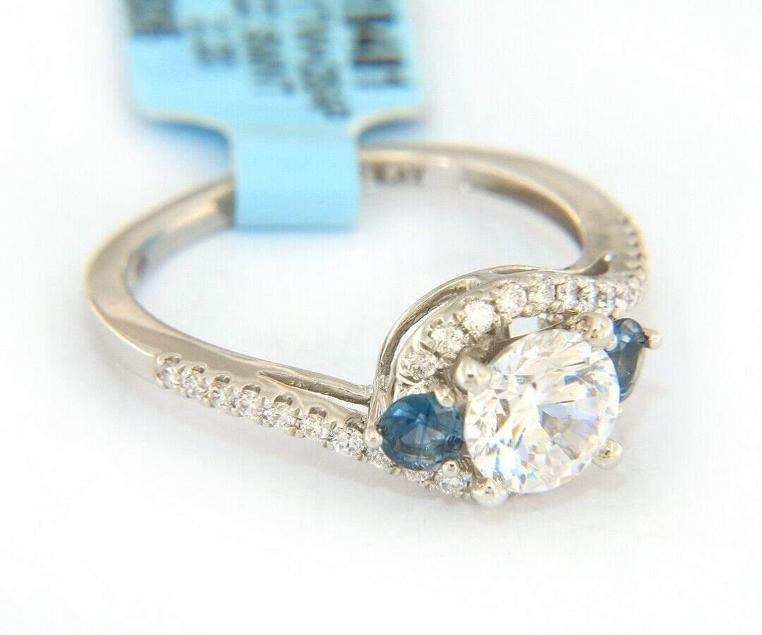 New Scott Kay Diamond and Sapphire Swirl Semi Mount Ring in 18K

Scott Kay Diamond and Sapphire Swirl Semi Mount Ring
18K White Gold
Diamonds Carat Weight: Approx. 0.21ctw
Sapphire Carat Weight: Approx. 0.32ctw
00ct CZ Center Stone
Ring Size: 6.50