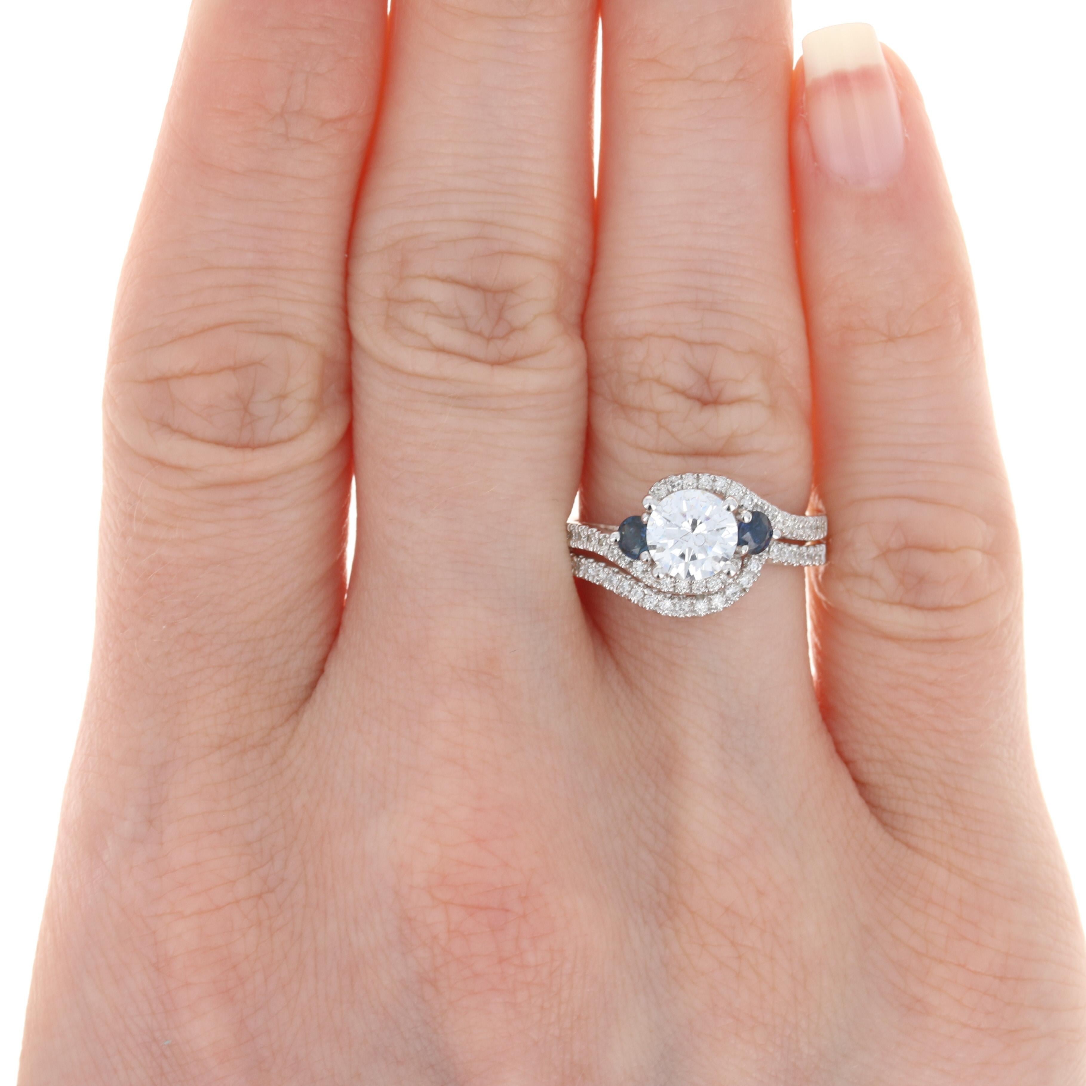 diamond solitaire with sapphire side stones