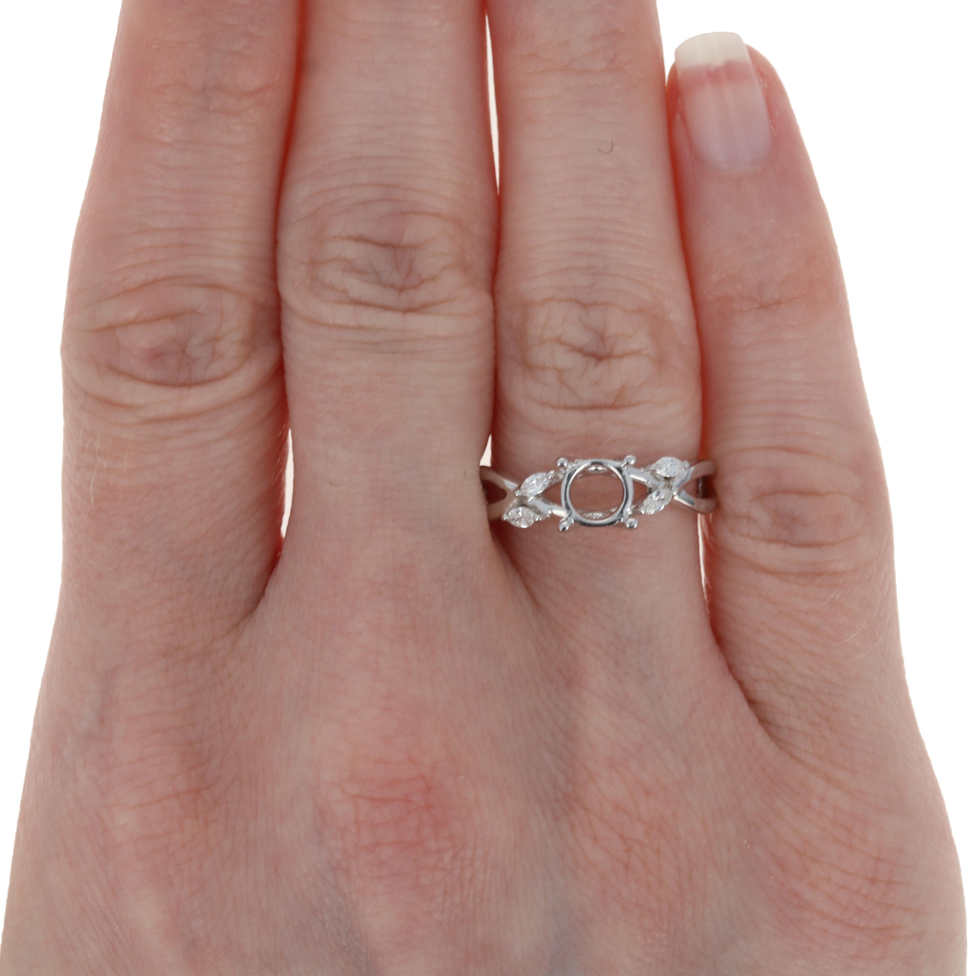 Searching for the perfect setting for an heirloom diamond or gemstone? Your quest ends here with this semi-mount wedding set. Fashioned in 14k white gold, this NEW set is comprised of an engagement ring that will accommodate a 6.5mm stone and a