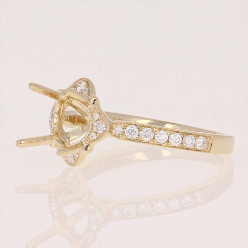 Surprise your sweetheart with an engagement ring personalized just for her! Featuring a gorgeous cathedral halo design, this NEW 14k yellow gold semi-mount ring showcases sparkling diamonds and milgrain work to elegantly frame the diamond or