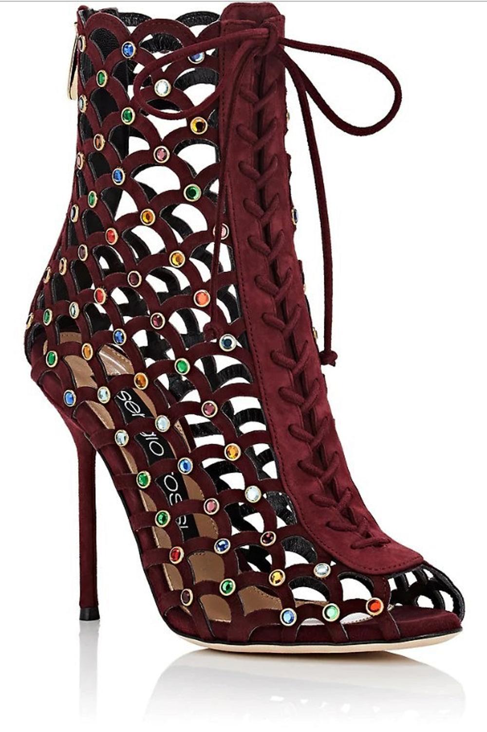 New Sergio Rossi Crystal-Embellished Ankle Boots
Designer size 39.5
Designed with scalloped edges, Sergio Rossi's laser-cut dark cherry suede ankle boots are embellished with multicolored round crystals.
Tonal round laces. Polished gold-tone