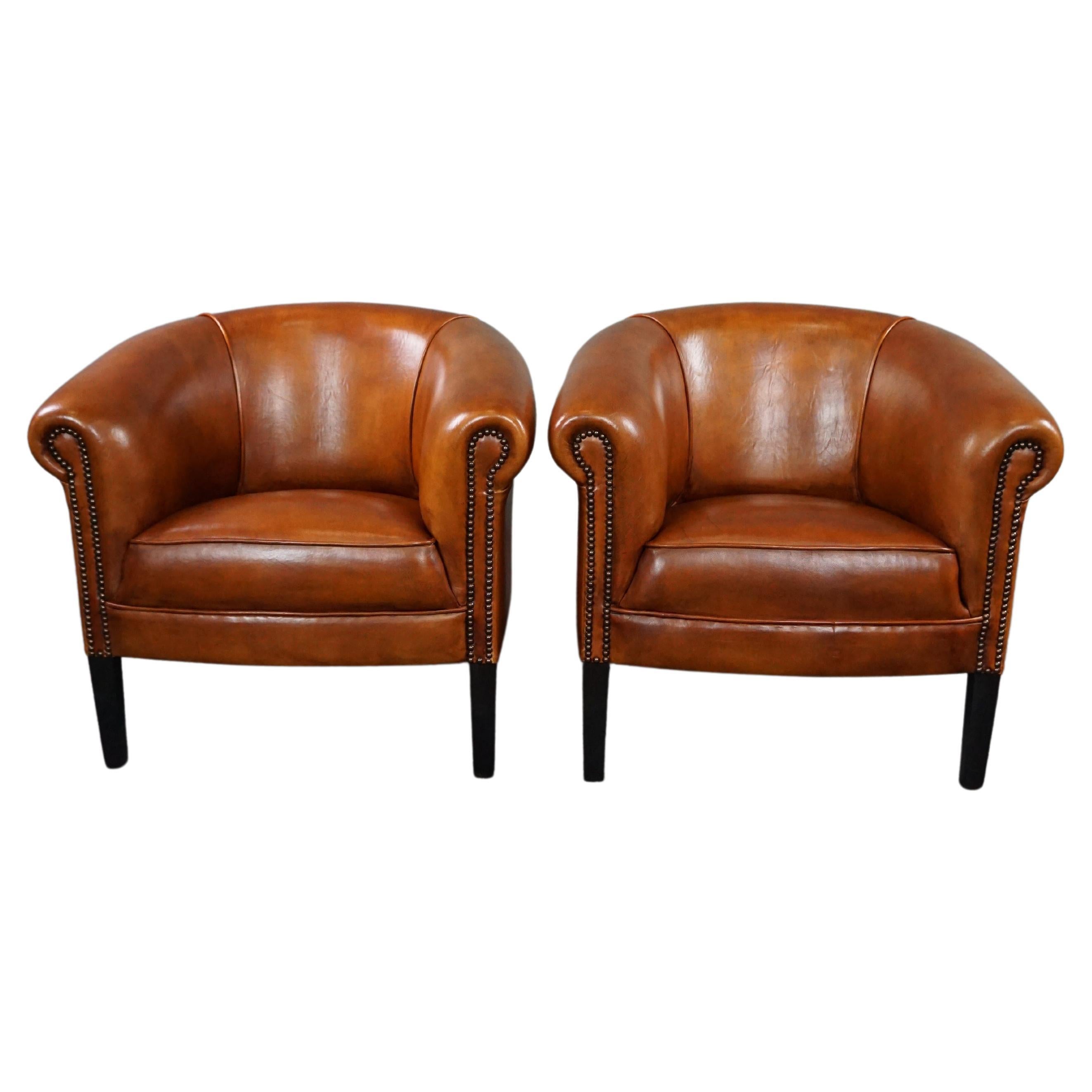 New set of 2 subtle sheep leather club chairs For Sale