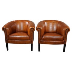 New set of 2 subtle sheep leather club chairs