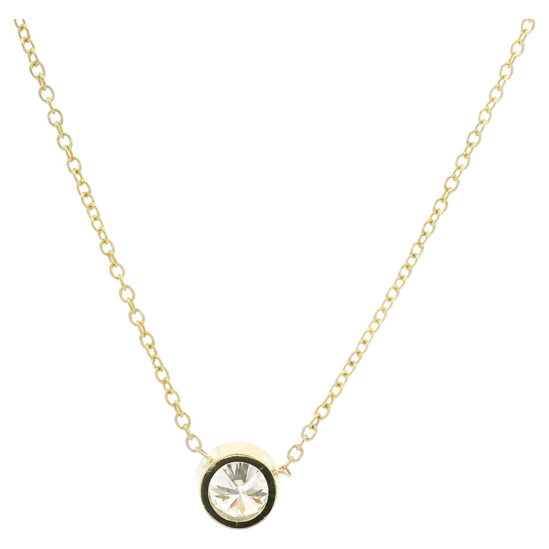 --Pierre(s) :...
(1) Diamants naturels authentiques - taille ronde et brillante - sertis en chaton - couleur H - pureté SI2 - 0,42ct (exact)

MATERIAL : Or jaune 14k massif
Poids : 1.72 grammes
Type de chaîne : Ajustable à 16