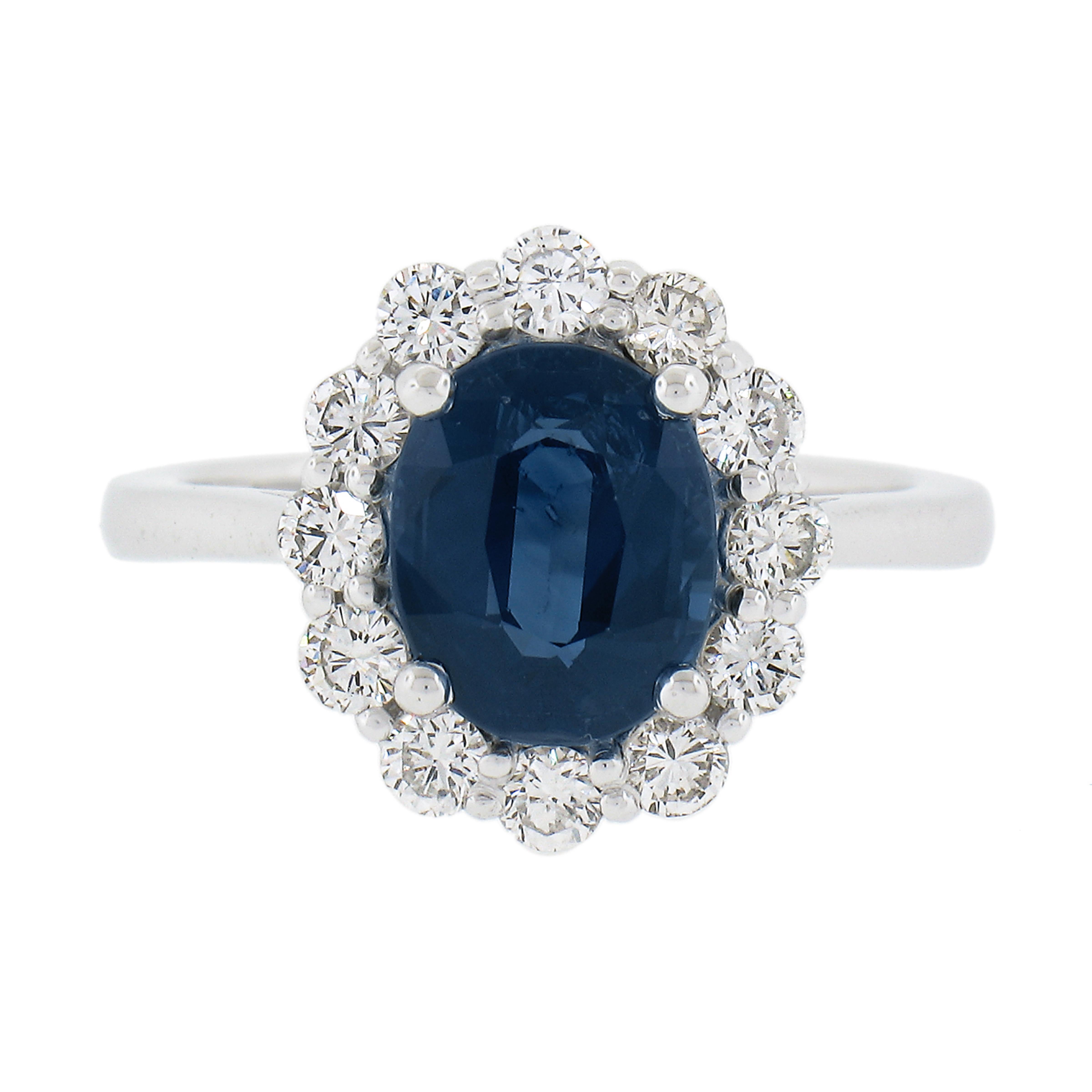 New Solid Platinum 3.25ctw GIA Oval Blue Sapphire & Round Diamond Halo Ring For Sale