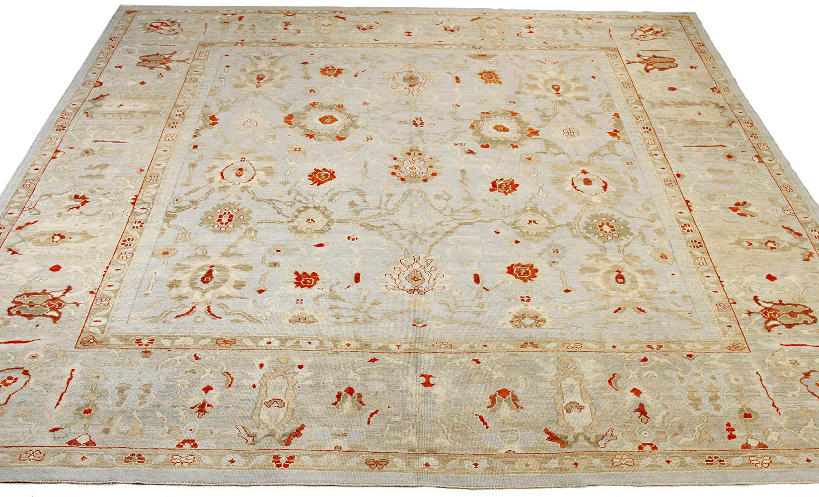 New Persian rug made of handwoven sheep’s wool of the finest quality. It’s colored with organic vegetable dyes that are certified safe for humans and pets alike. It features rows of flower medallion details all-over associated with Oushak weaving