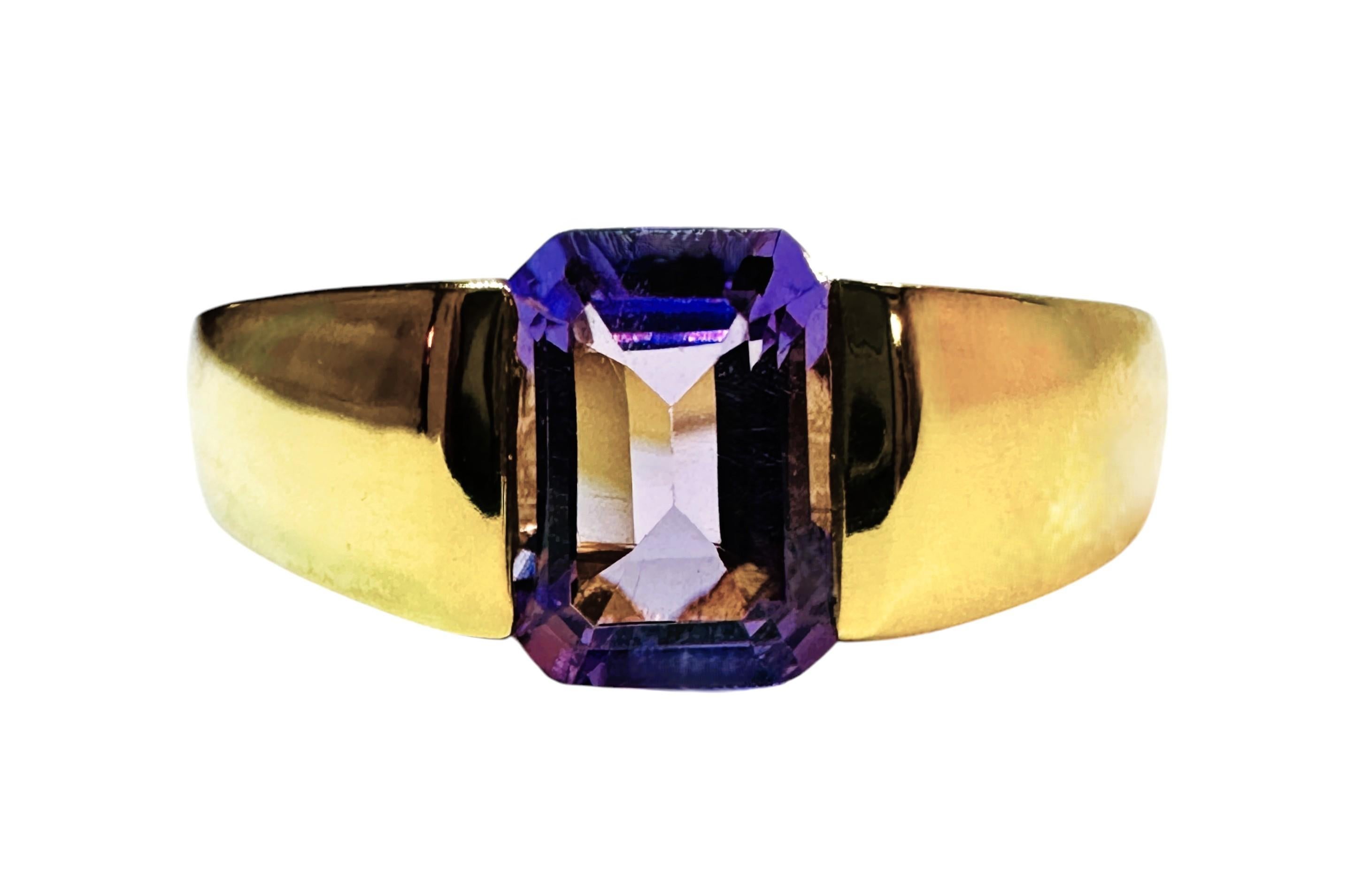 This ring is just stunning!  The design is simple and elegant.  It is a size 6.75.  It has a beautiful solitaire emerald cut amethyst center stone that is 110 cts.  The stone measures 7 x 5 mm and is in a beautiful yellow gold plated setting.  The