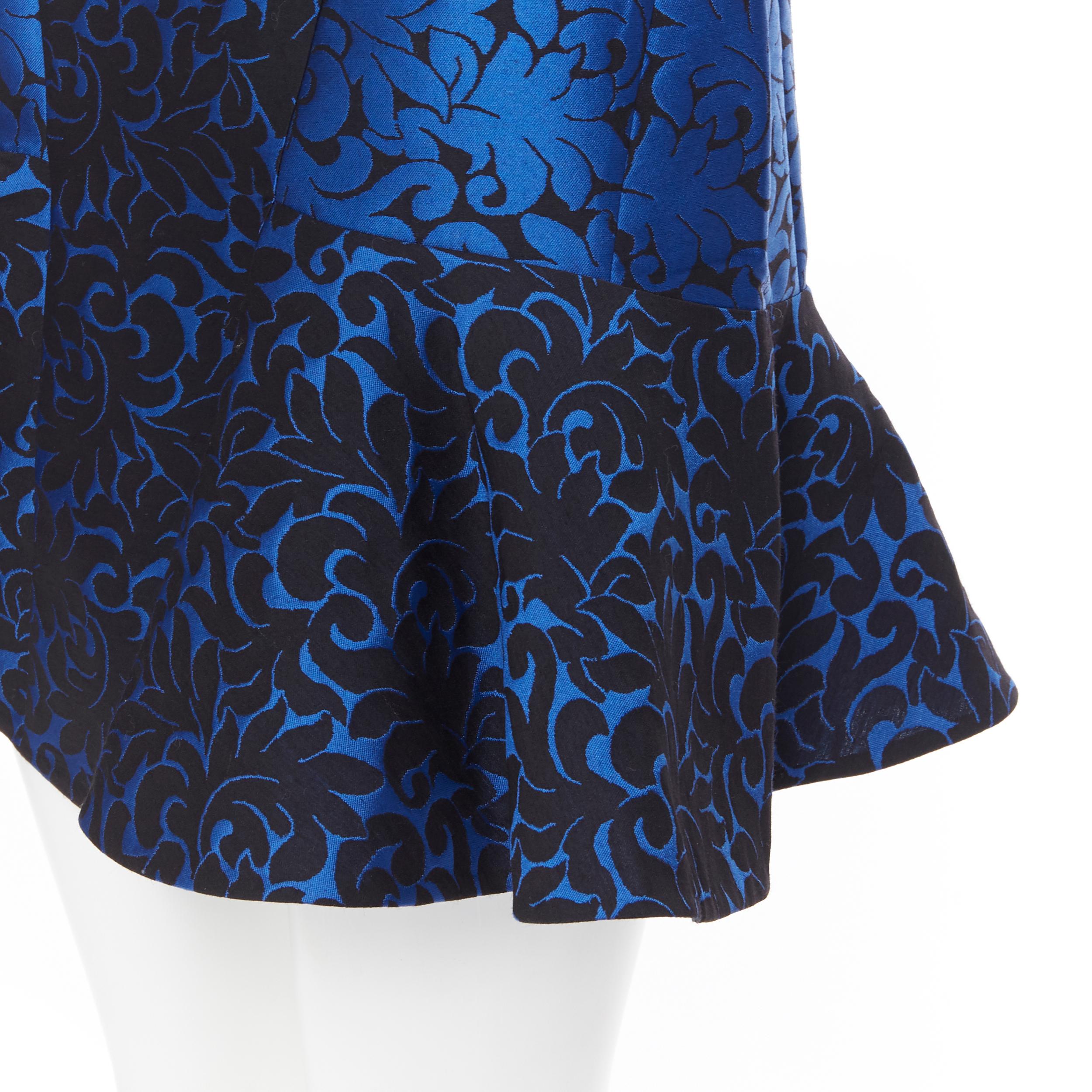 new STELLA MCCARTNEY 2012 blue black floral jacquard fit flared skirt IT36 XS
Brand: Stella McCartney
Designer: Stella McCartney
Collection: 2012
Model Name / Style: Flared skirt
Material: Wool, polyester
Color: Blue, black
Pattern: Floral
Closure: