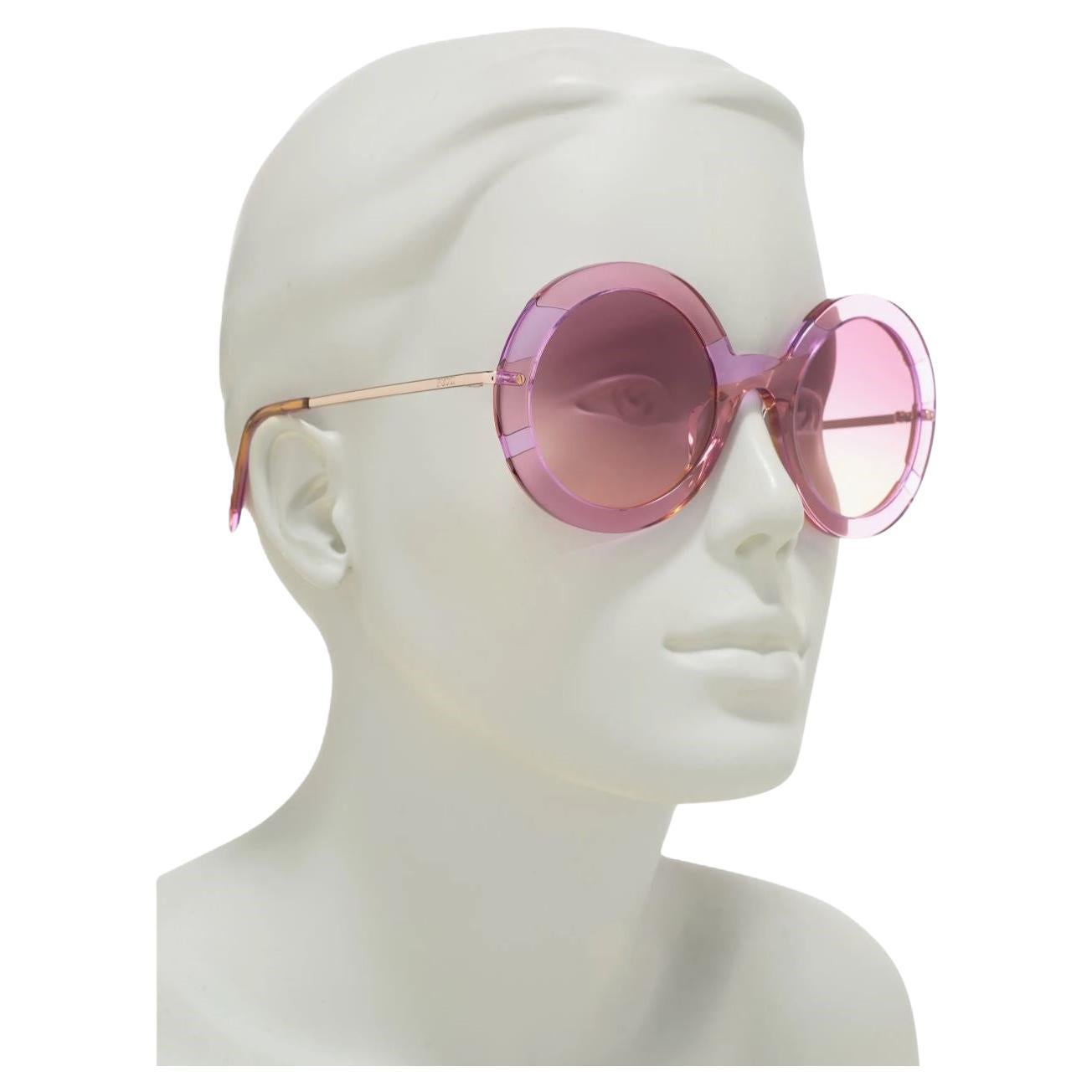 Gafas de sol Emilio Pucci
Nuevo
* Impresionantes gafas de sol clásicas Pucci estilo años 70
* Marcos Rosa Lucite Estampado Pucci
* Herrajes de oro 
* Logotipo Pucci

* ZYL hecho a mano en Italia
* 100% de protección UV
* Viene con funda y ropa de