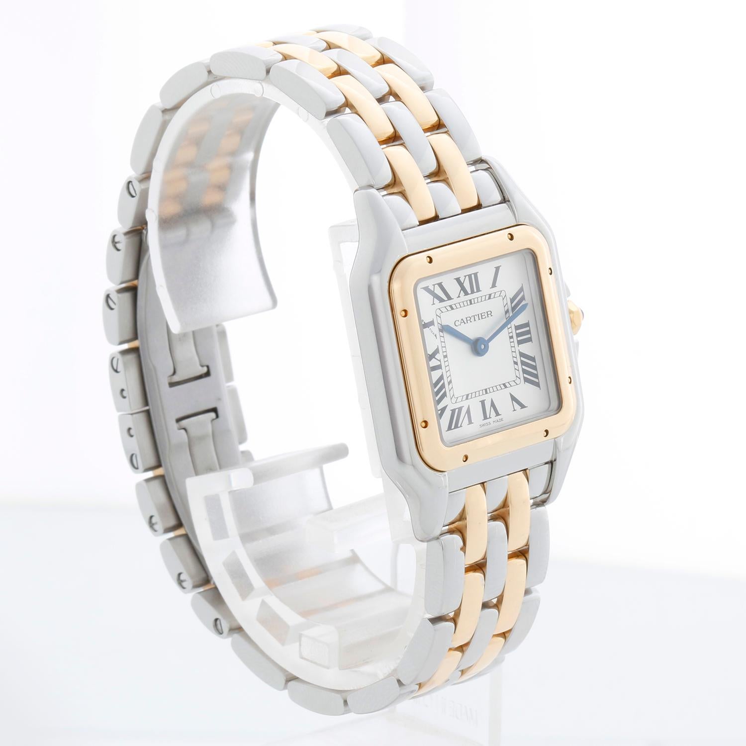 New Style Cartier Panthere 2-Tone 2-Row Medium Watch W2PN0007 - Quartz. Panthere. Stainless steel case with 18k yellow gold bezel ( 29mm x 37mm ). Silver colored dial with black Roman numerals. Stainless steel and 2-row 18k yellow gold Panthere